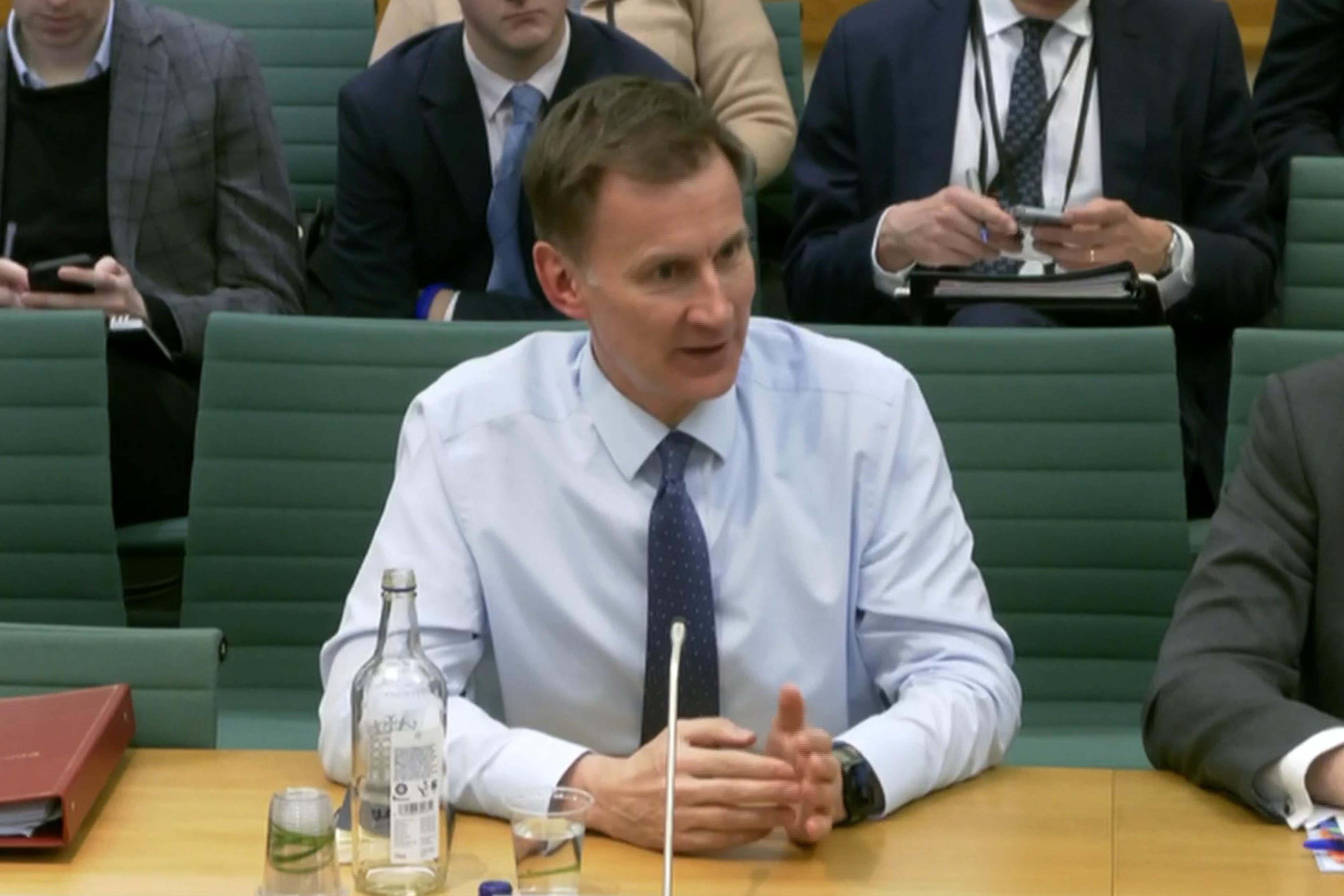 Chancellor Jeremy Hunt appearing before the Treasury Committee (House of Commons/PA)