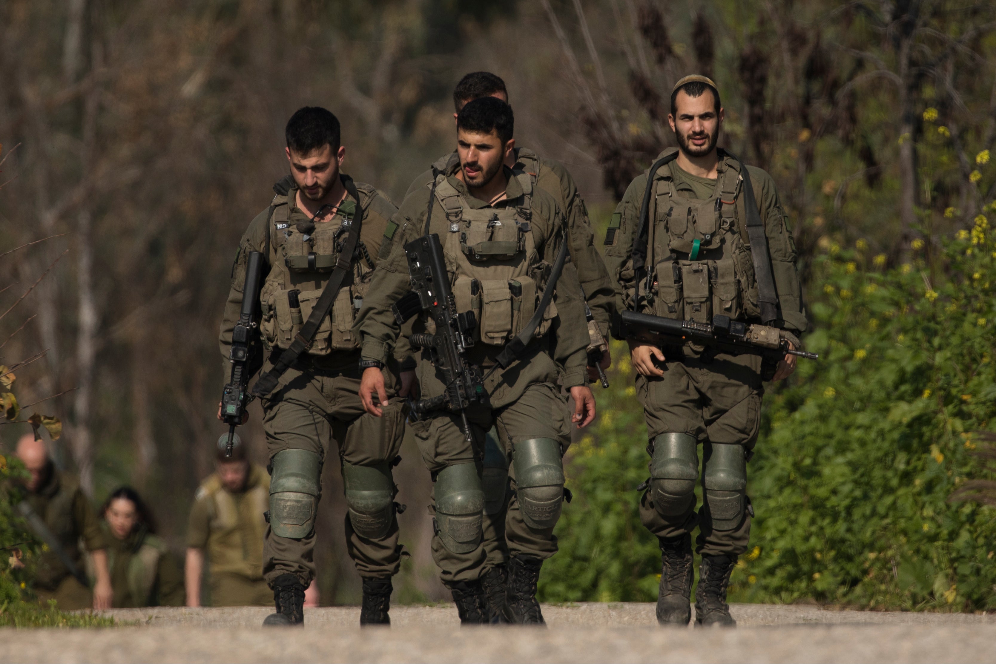 Israeli soldiers patrol the border with Lebanon on Monday