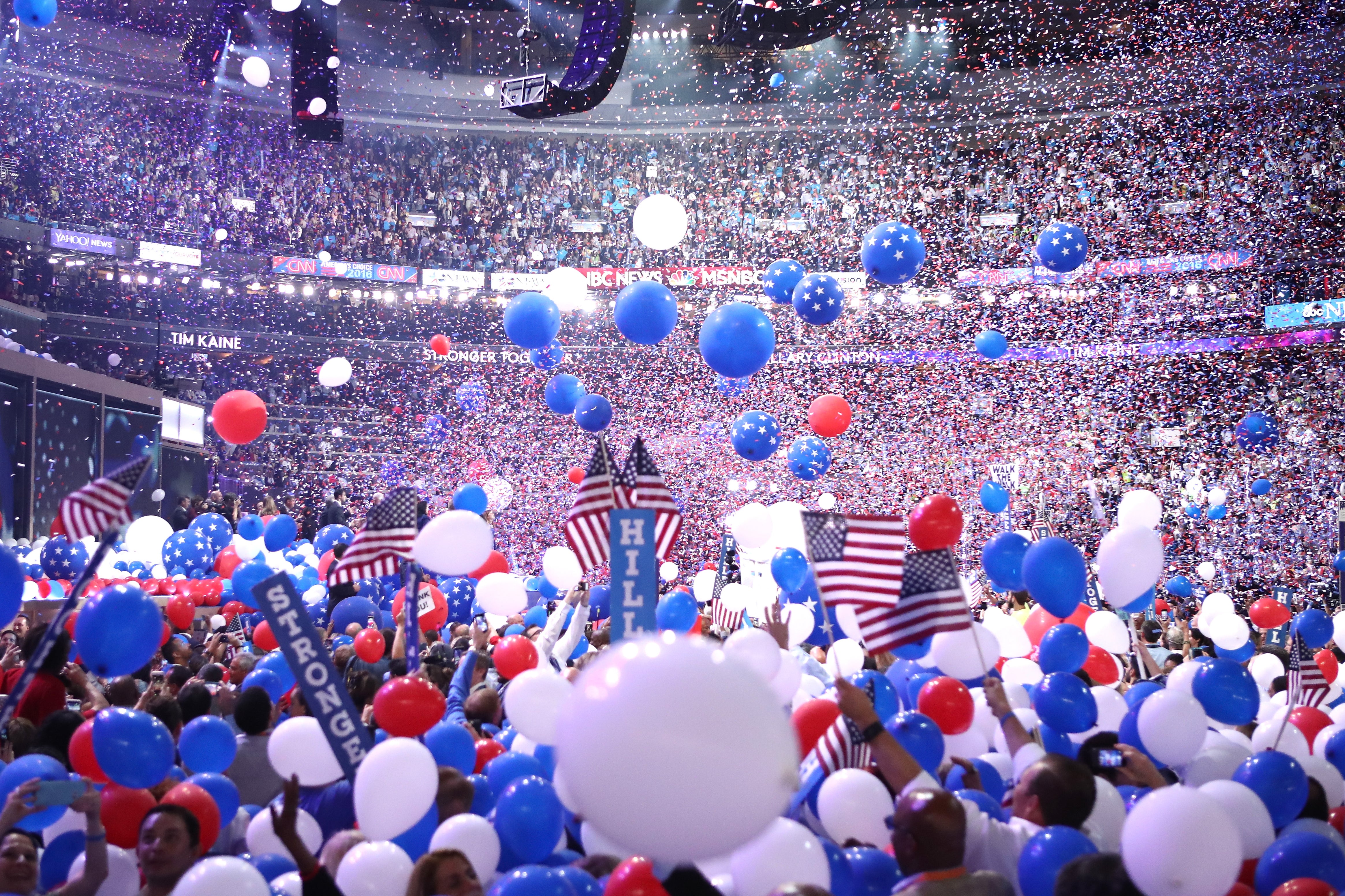 Balloons fall over delegates and attendees at the end of the fourth day of the Democratic National Convention at the Wells Fargo Center, July 28, 2016 in Philadelphia, Pennsylvania