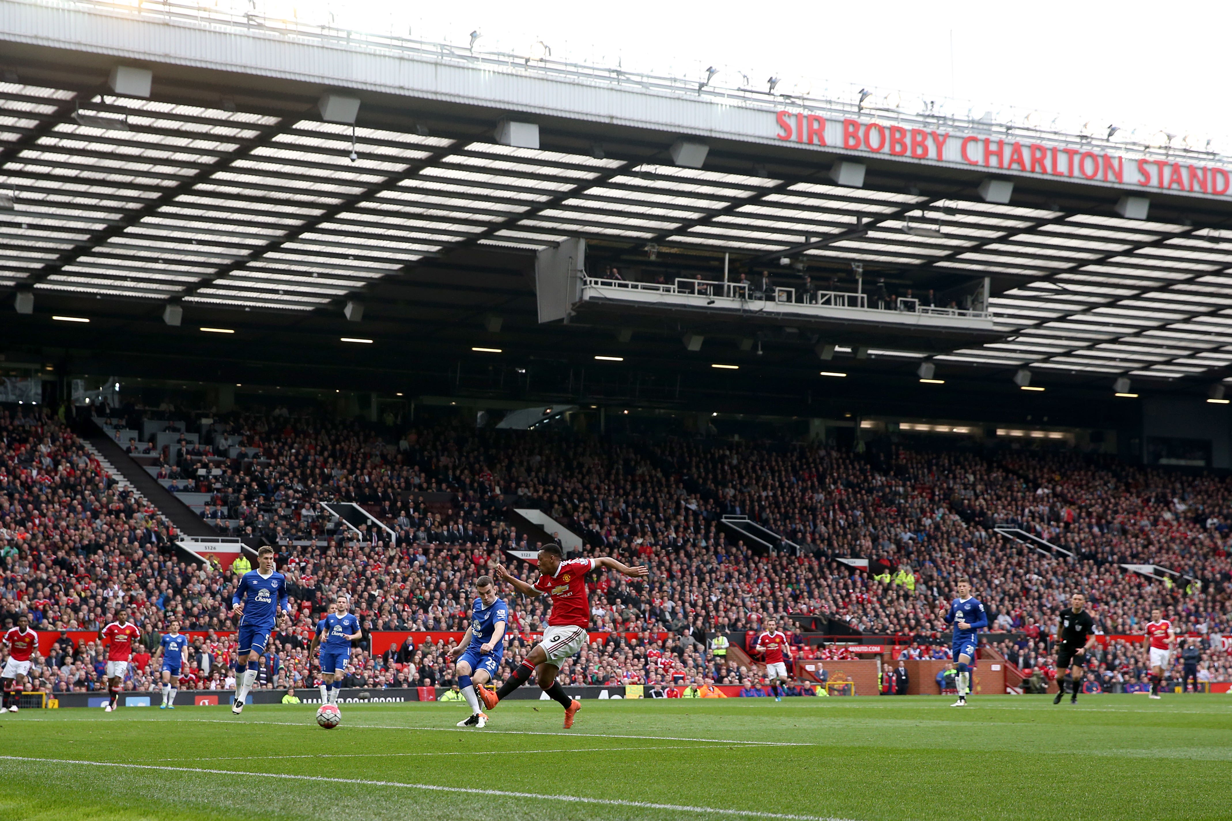 Fans are being moved from the Sir Bobby Charlton stand at Old Trafford (Martin Rickett/PA)