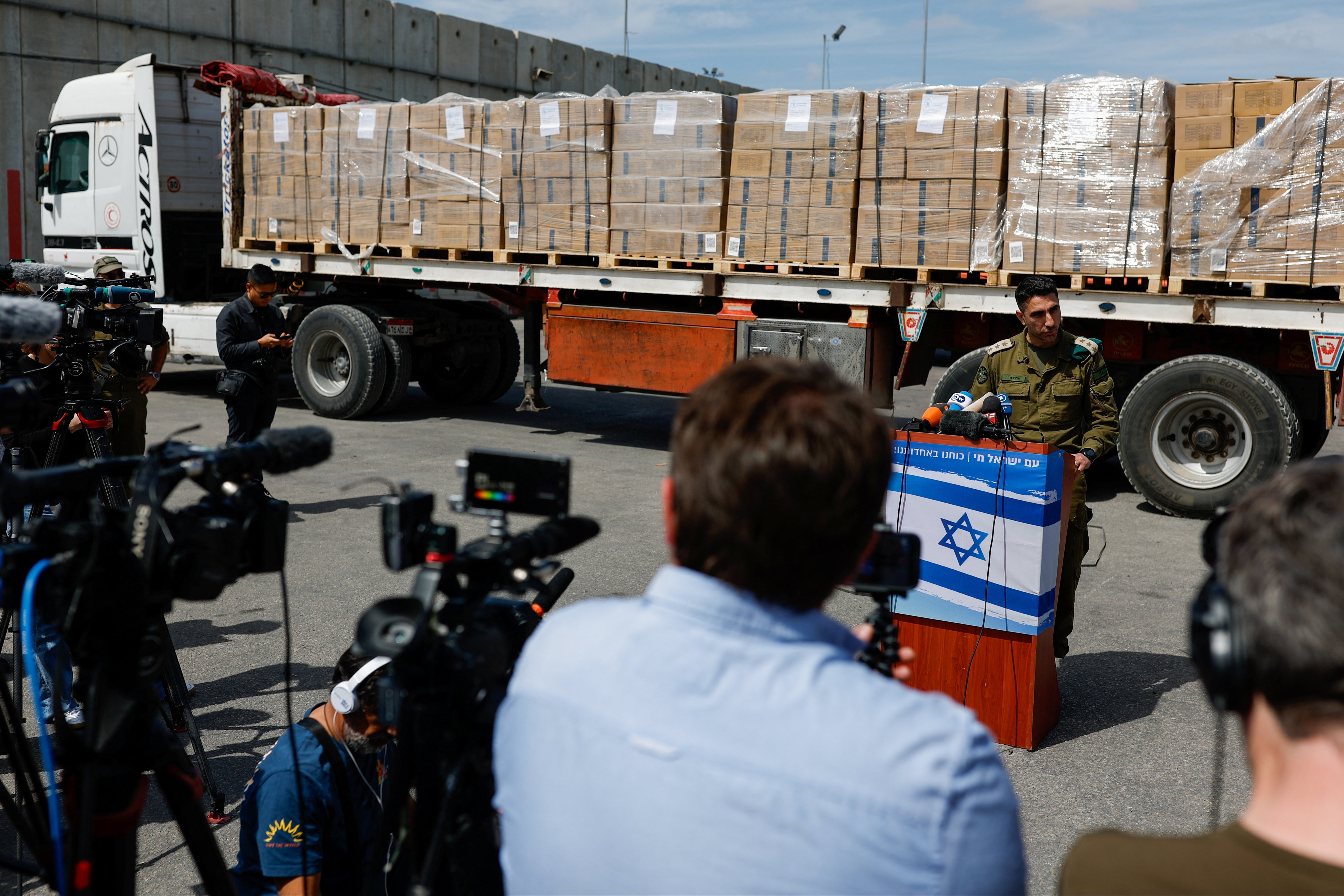 Head of Israel’s COGAT, Colonel Elad Goren, speaks from the Kerem Shalom crossing into Gaza