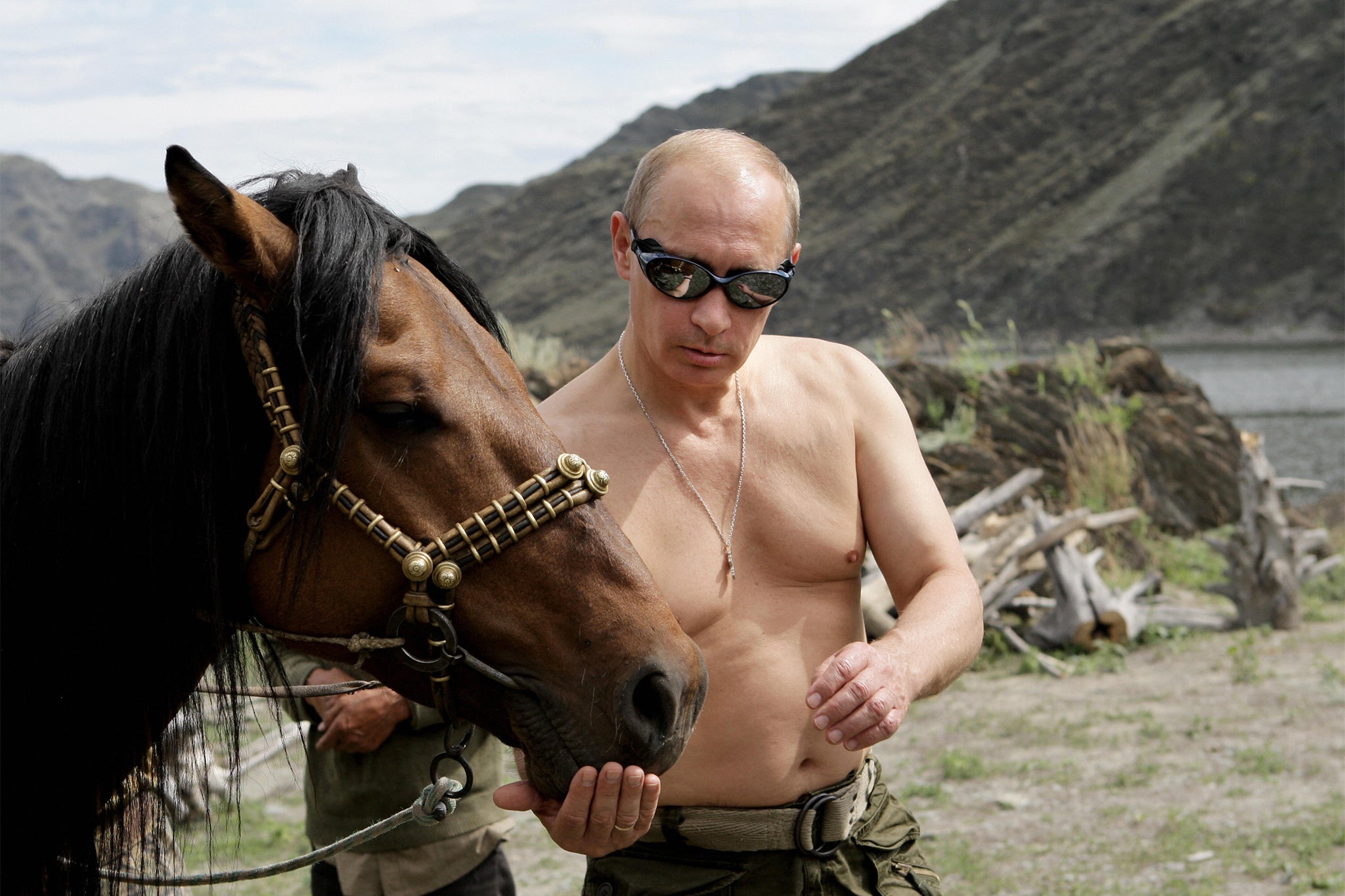 Putin pictured with a horse during a holiday outside the town of Kyzyl in southern Siberia in 2009