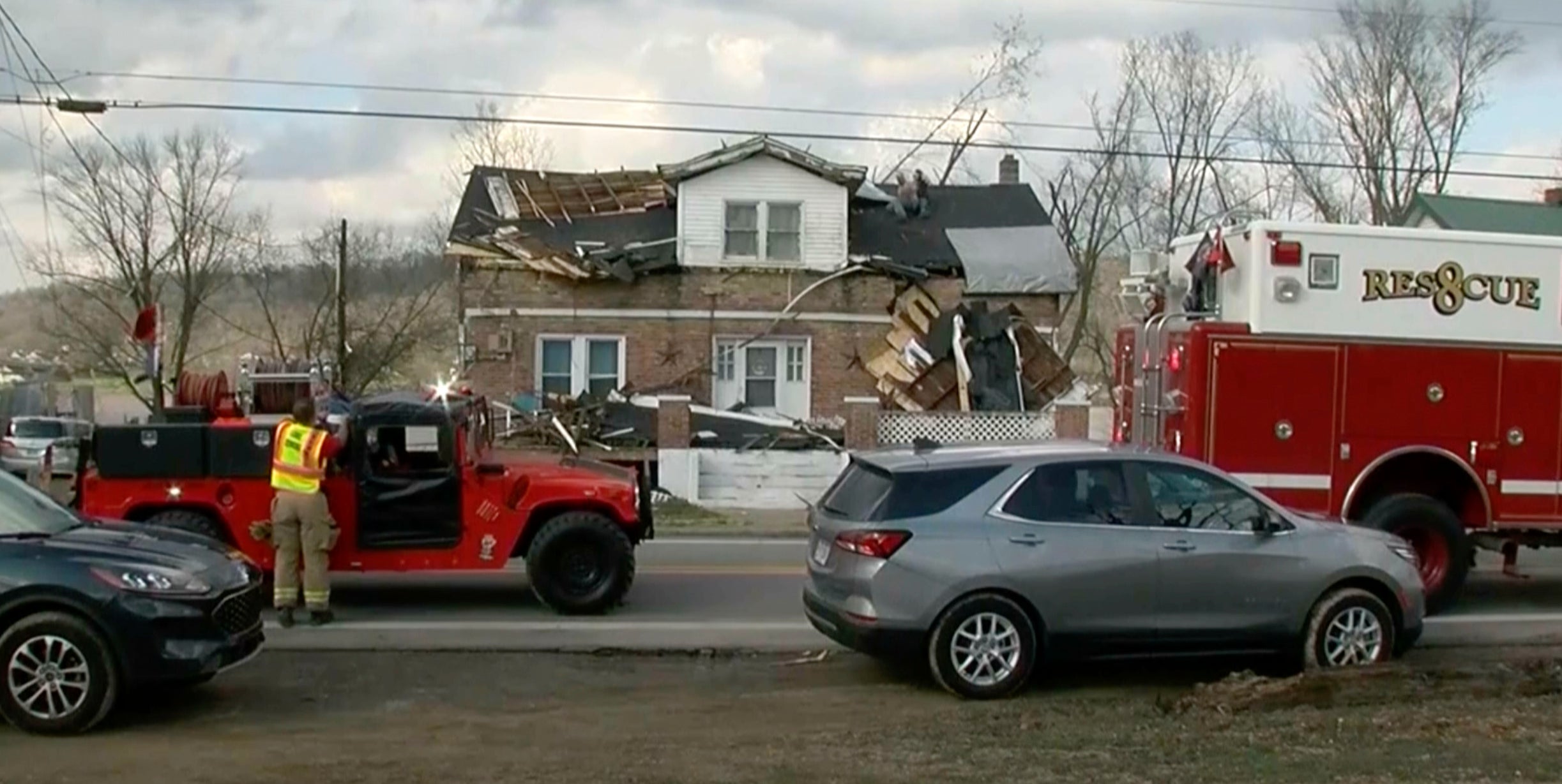 A home damaged by severe weather in Milton, Kentucky