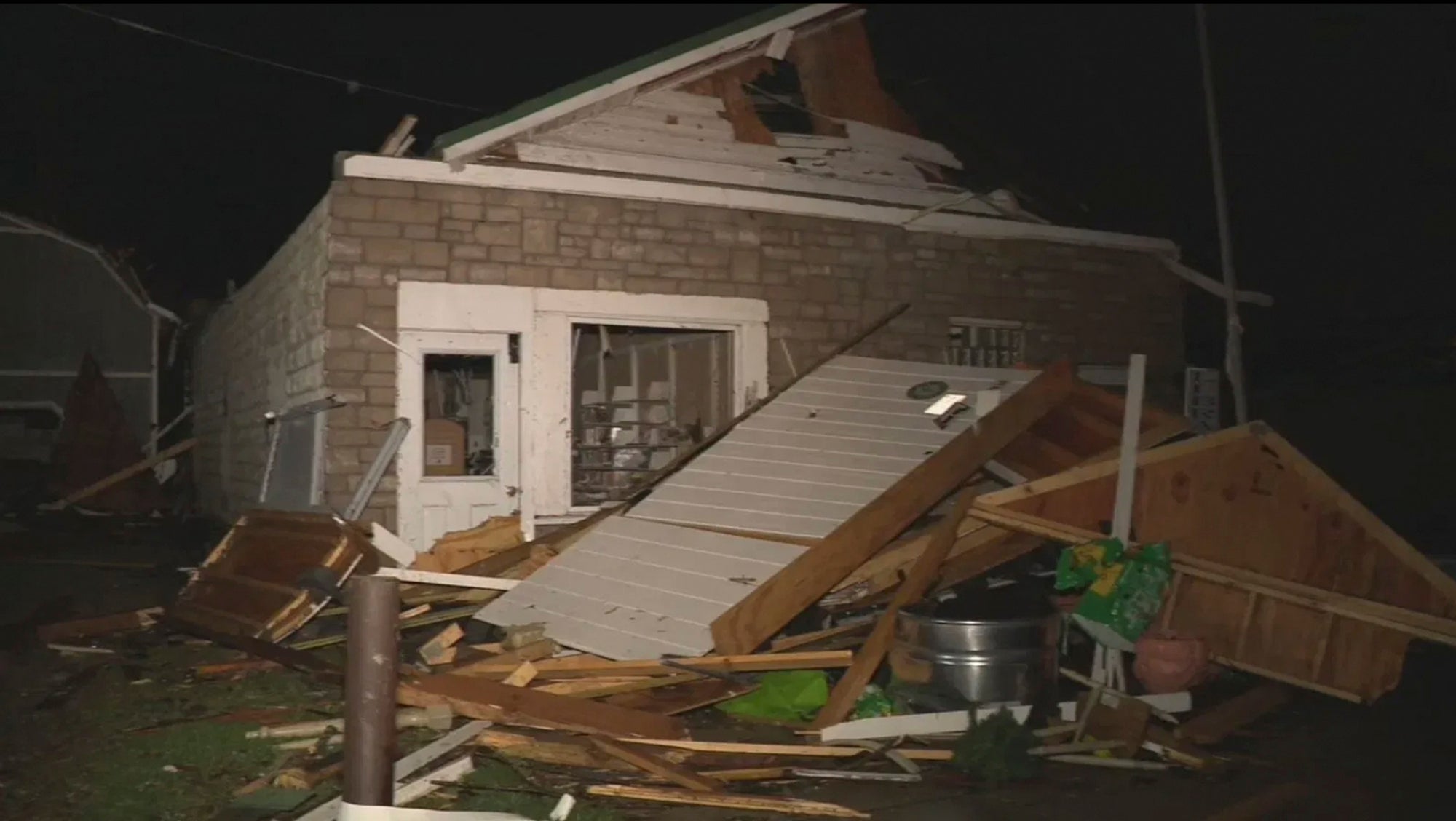 A damaged home in Lakeview, Ohio. At least three people are dead in Ohio after tornadoes tore through Midwest states overnight