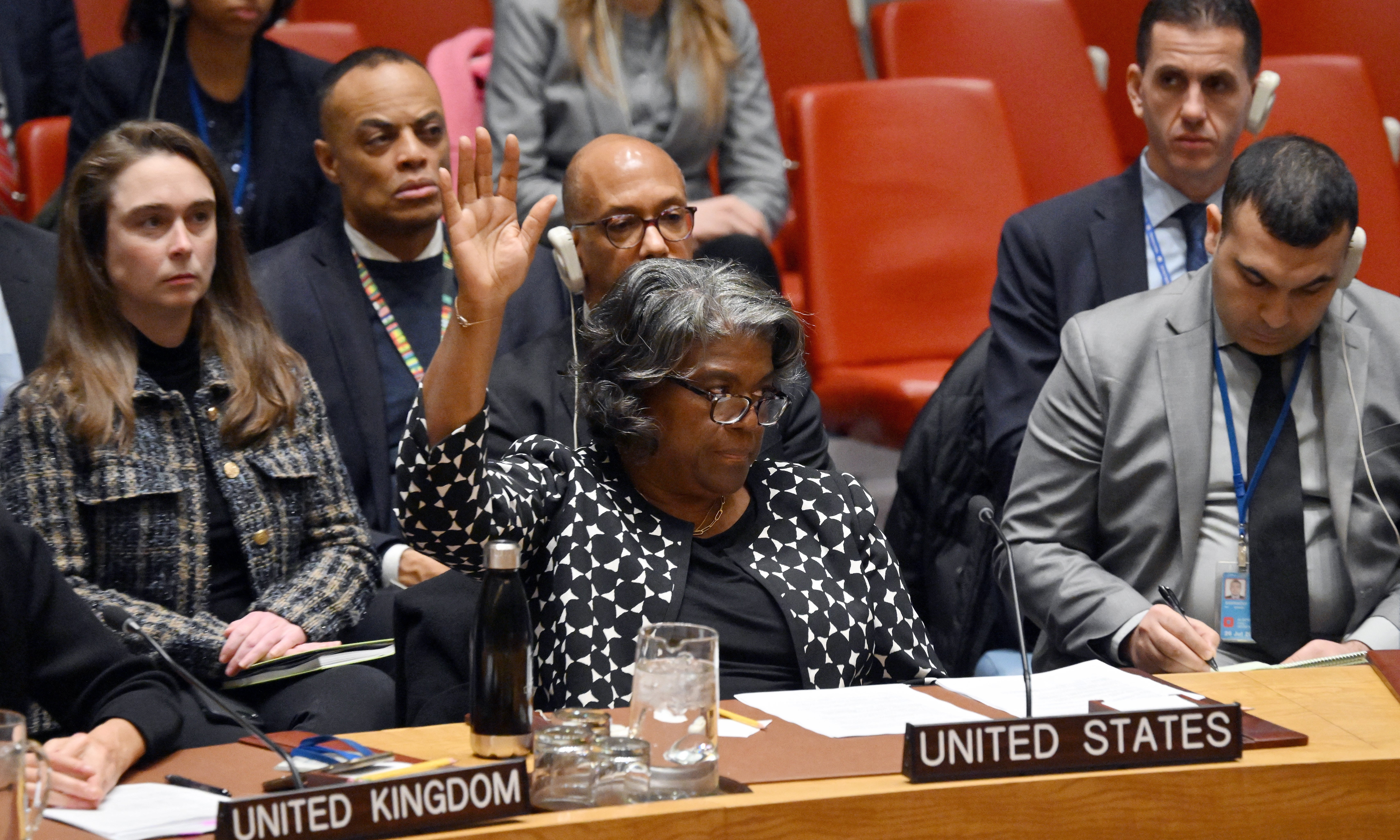 US Ambassador the UN Linda Thomas-Greenfield raises her hand at a February meeting, vetoing a ceasefire resolution