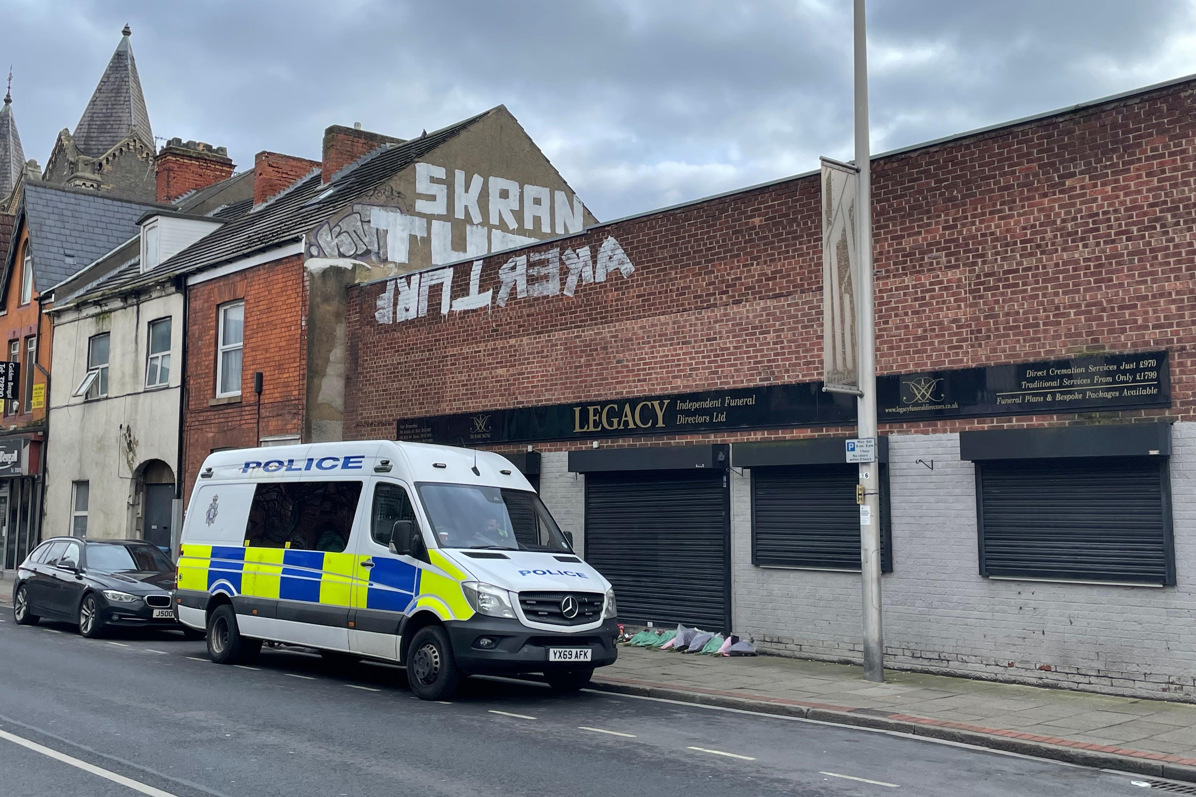 Police outside the Hessle Road branch of Legacy Independent Funeral Directors in Hull (Dave Higgens/PA)