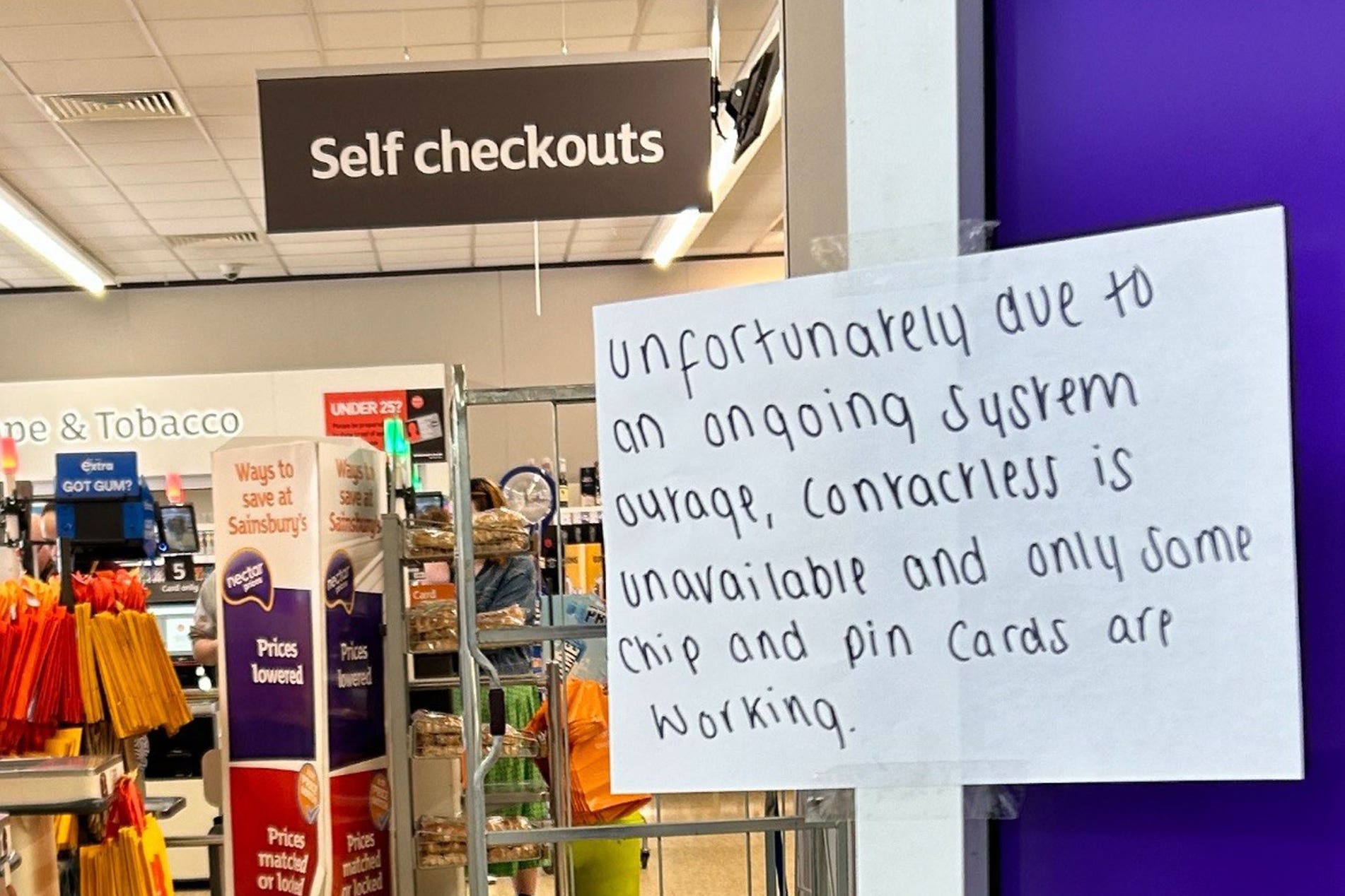 A notice informing customers of technical issues at a Sainsbury’s in Huddersfield