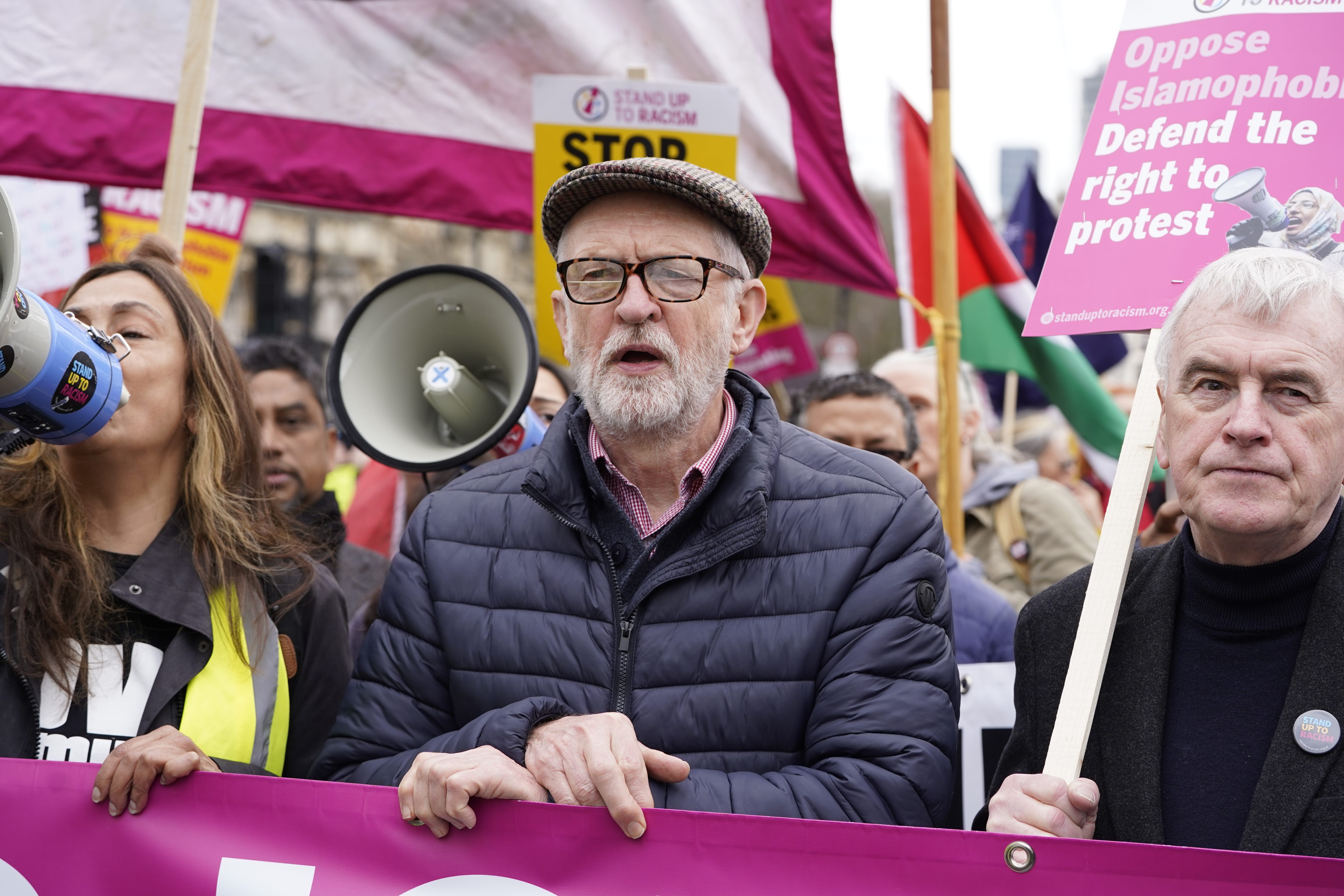 Former Labour Party leader Jeremy Corbyn and ex-shadow chancellor John McDonnell at the protest