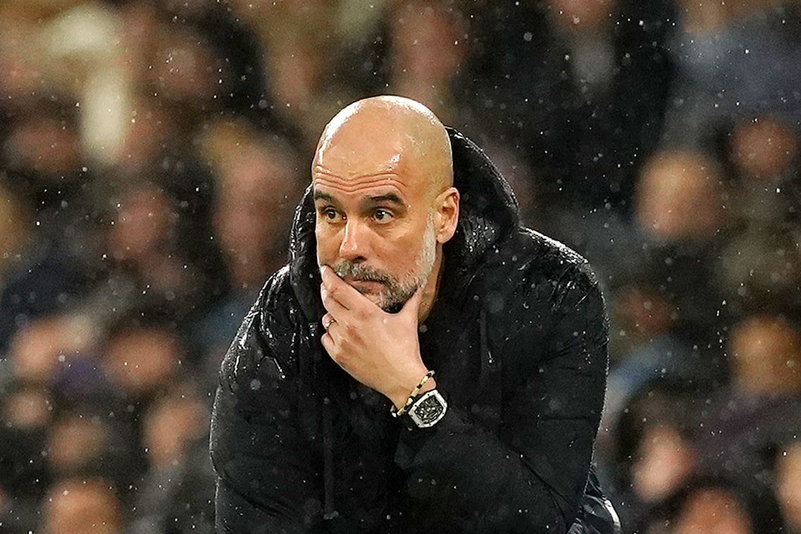 Manchester City manager Pep Guardiola reacts on the touchline during the Emirates FA Cup quarter-final match at the Etihad Stadium, Manchester. Picture date: Saturday March 16, 2024.