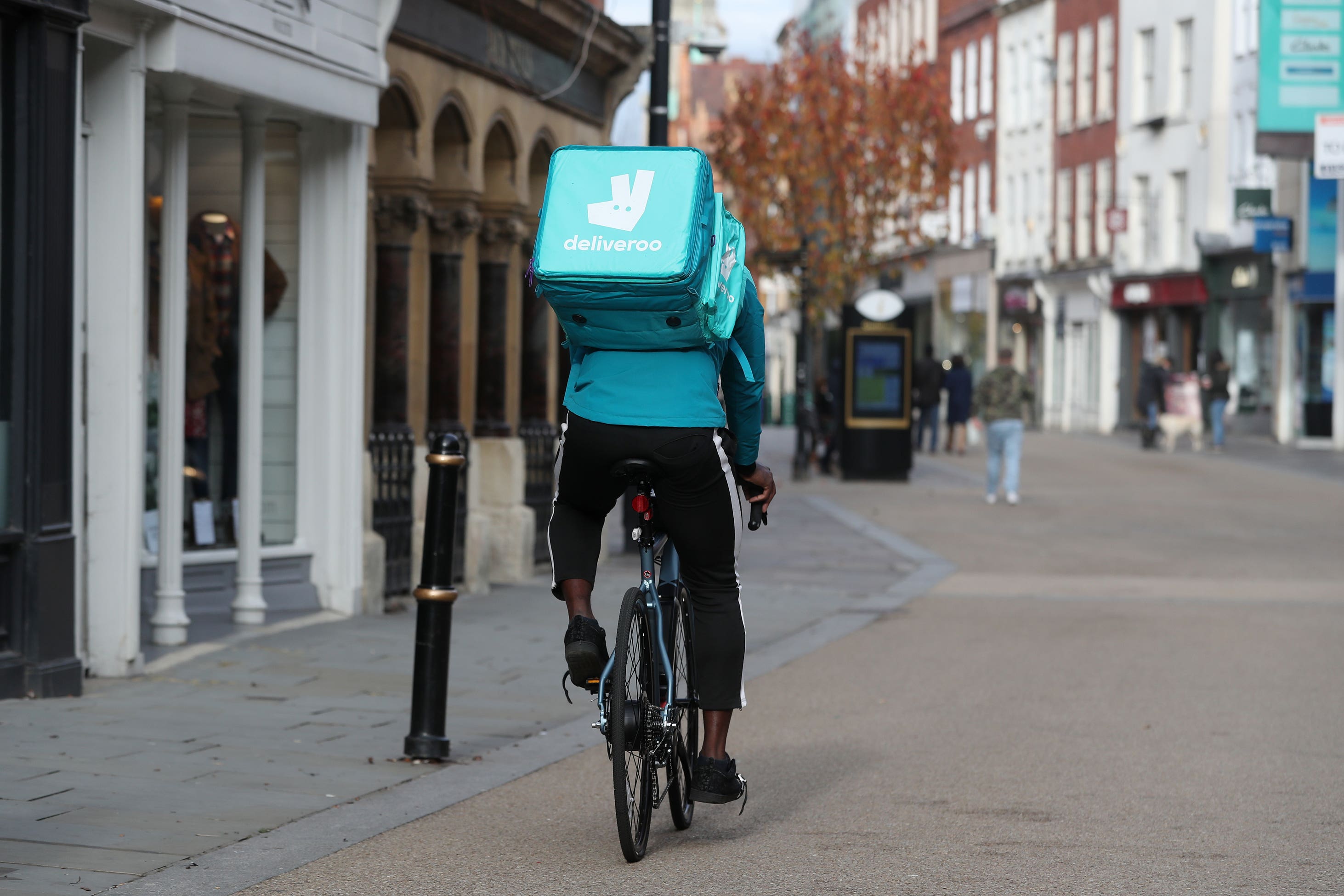 Food delivery giant Deliveroo is offering free childcare to riders (David Davies/PA)