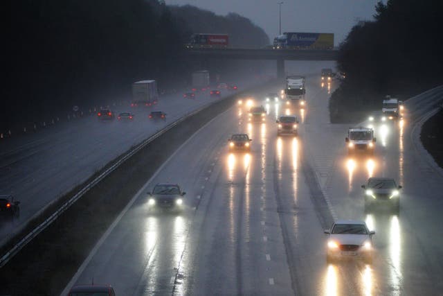 <p>Cars on a motorway as the UK’s financial regulator is currently reviewing whether people could be owed compensation </p>