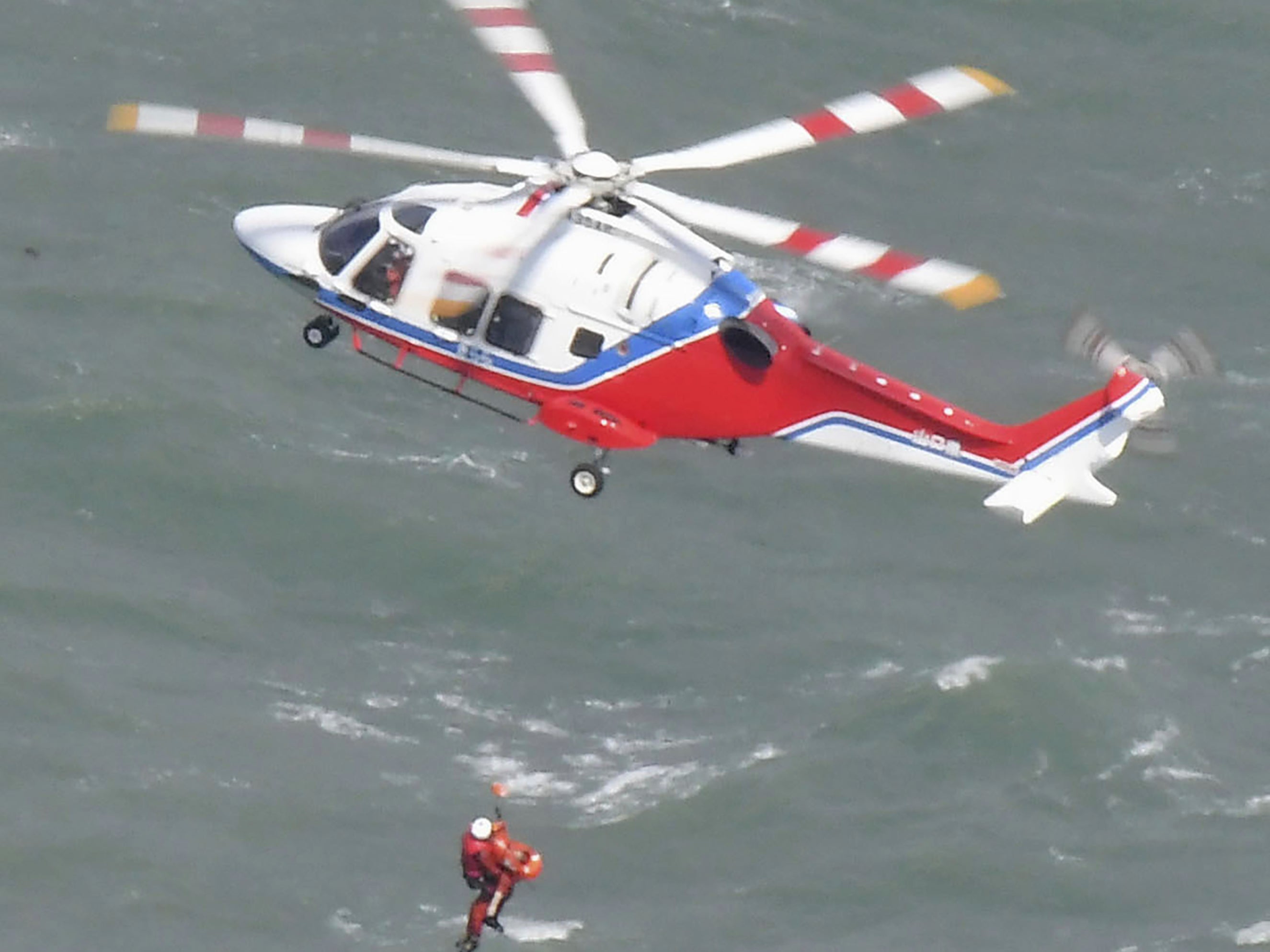 A rescue operation is conducted as a South Korean tanker capsized off Shimonoseki, Yamaguchi prefecture, southwestern Japan Wednesday, 20 March, 2024