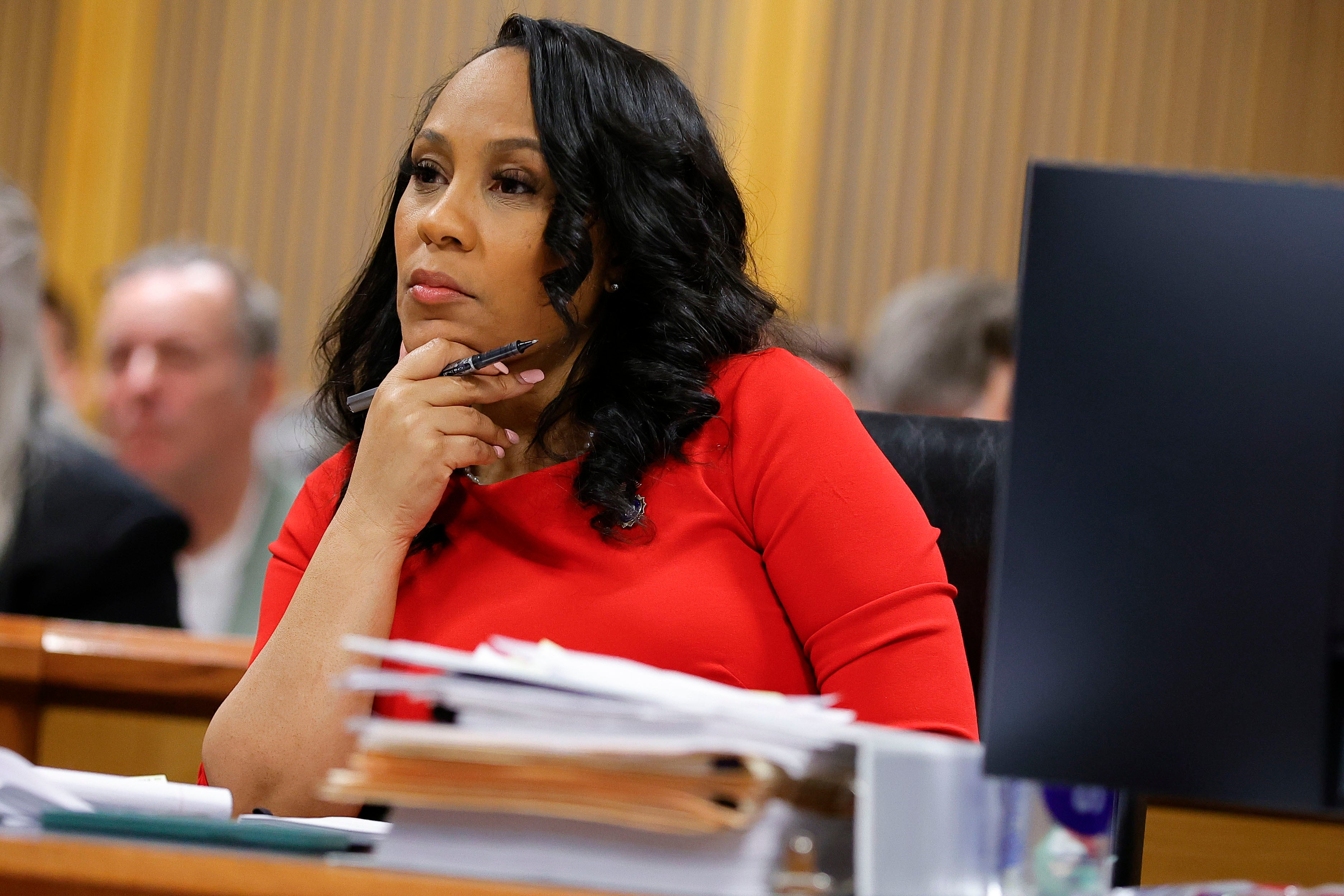 Fulton County district attorney Fani Willis looks on during a hearing on the Georgia election interference case on 1 March 2024 in Atlanta