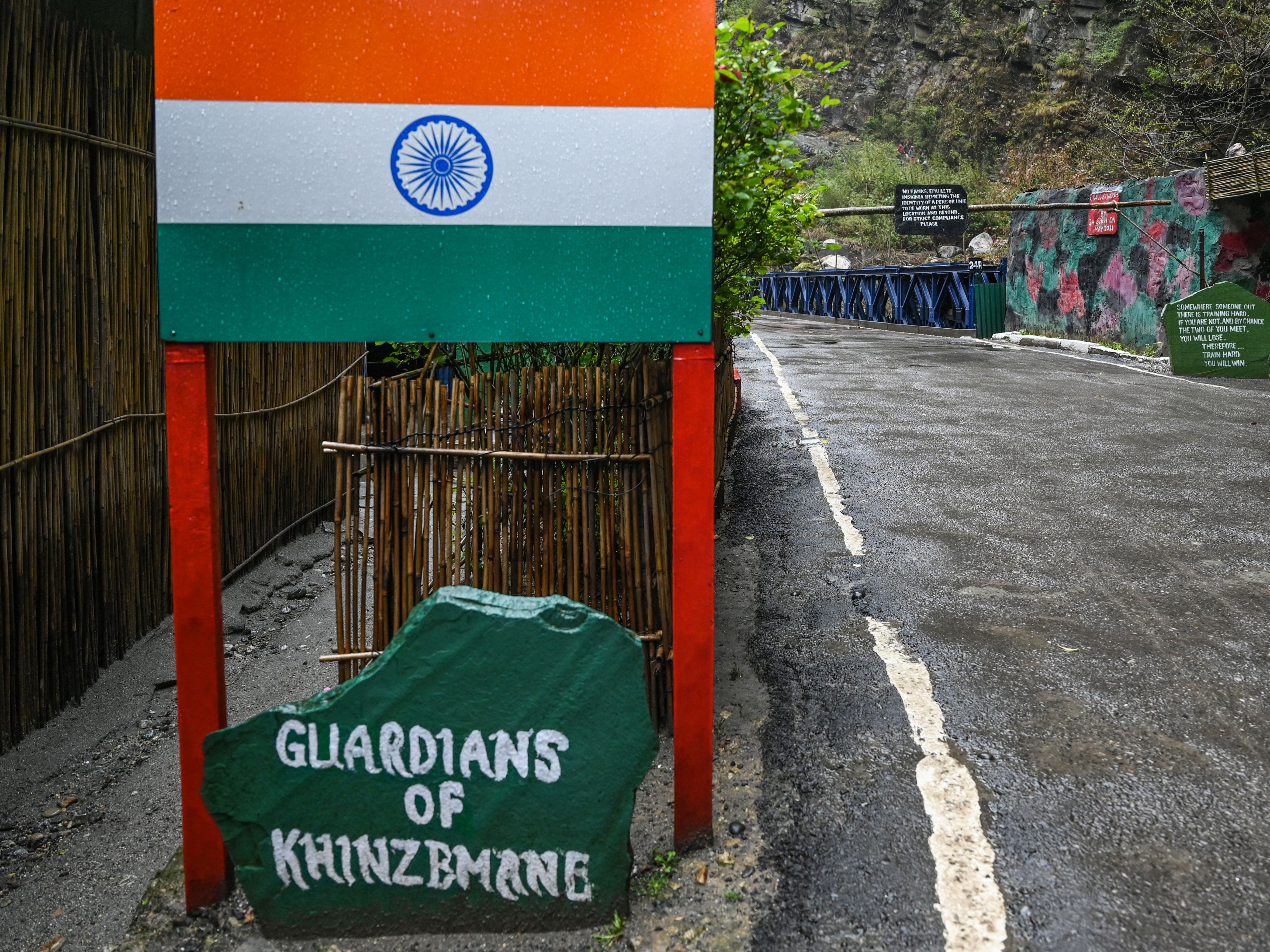 This picture taken on 4 April 2023 shows an Indian border post near the frontier with China in Khinzemane, in India’s Arunachal Pradesh state. - Freshly laid roads, bridges, upgraded military camps, and new civilian infrastructure dot the winding high Himalayan route to the Indian frontier village of Zemithang -- which China renamed last month to press its claim to the area. It is in the far northeastern Indian state of Arunachal Pradesh, almost all of which Beijing insists falls under its sovereignty as 'South Tibet’