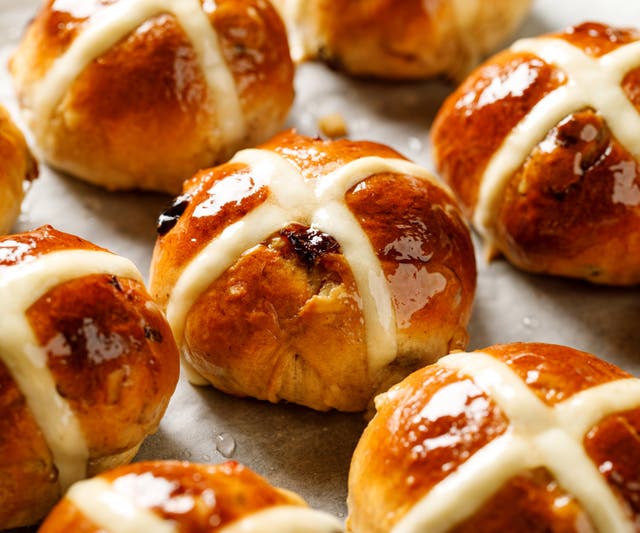 <p>Traditional buns contain dried fruit and spices like cinnamon and nutmeg</p>