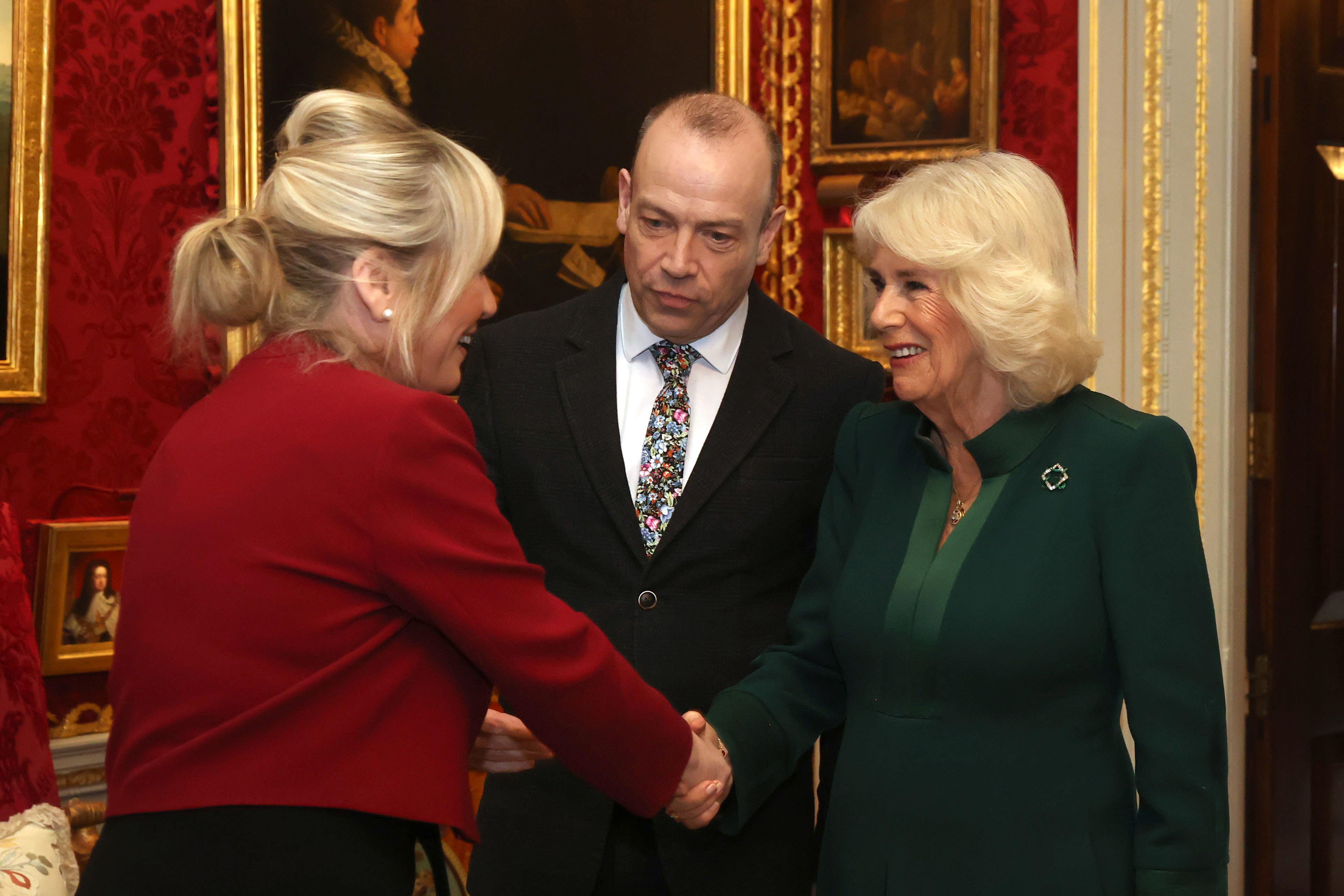 Queen Camilla (right) meets First Minister Michelle O’Neill (left) with Northern Ireland Secretary Chris Heaton-Harris (centre) as she attends an event hosted by the Queen’s Reading Room to mark World Poetry Day at Hillsborough Castle in Belfast, during her two-day official visit to Northern Ireland (Liam McBurney/PA)