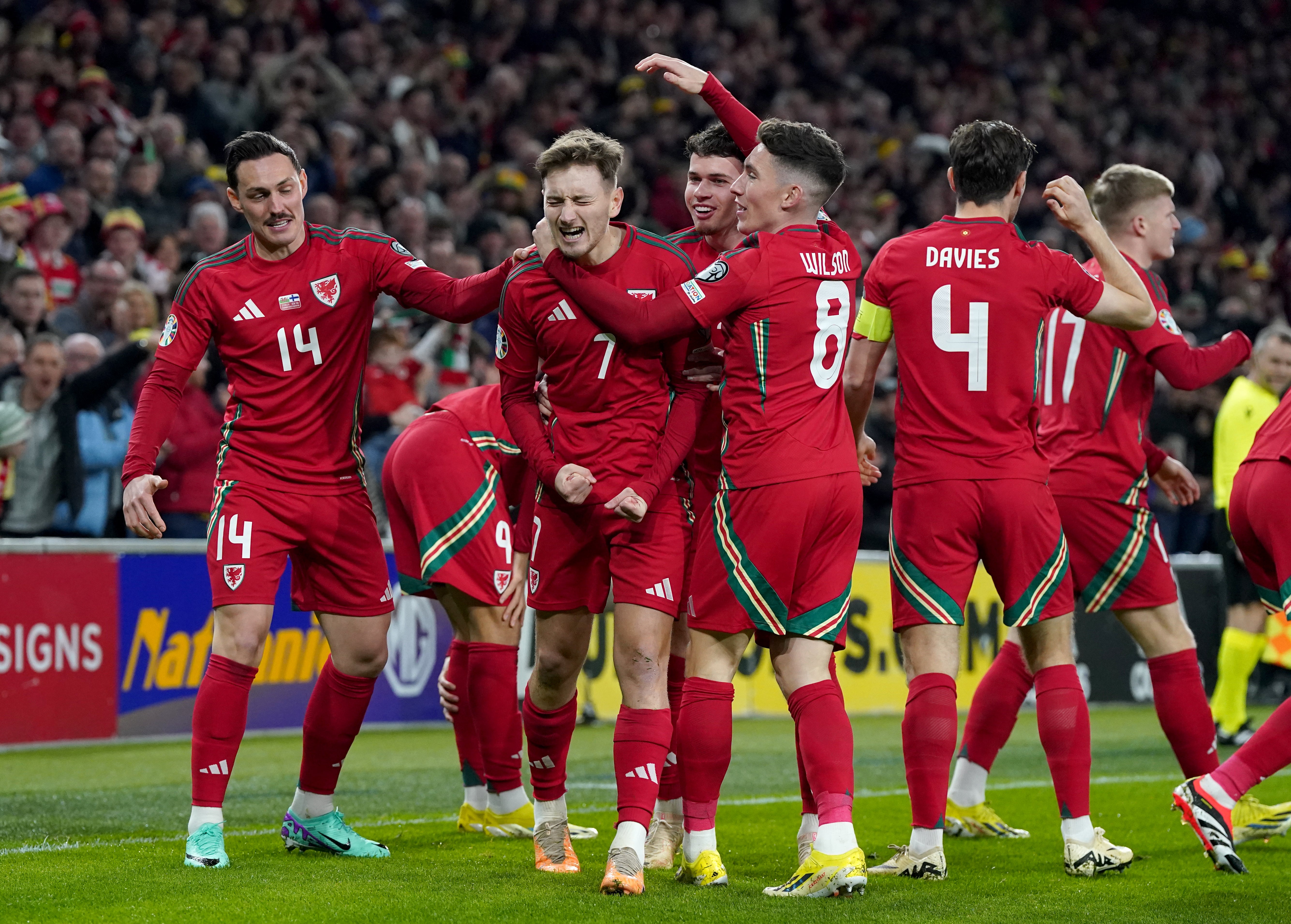 Teammates mob the goalscorer