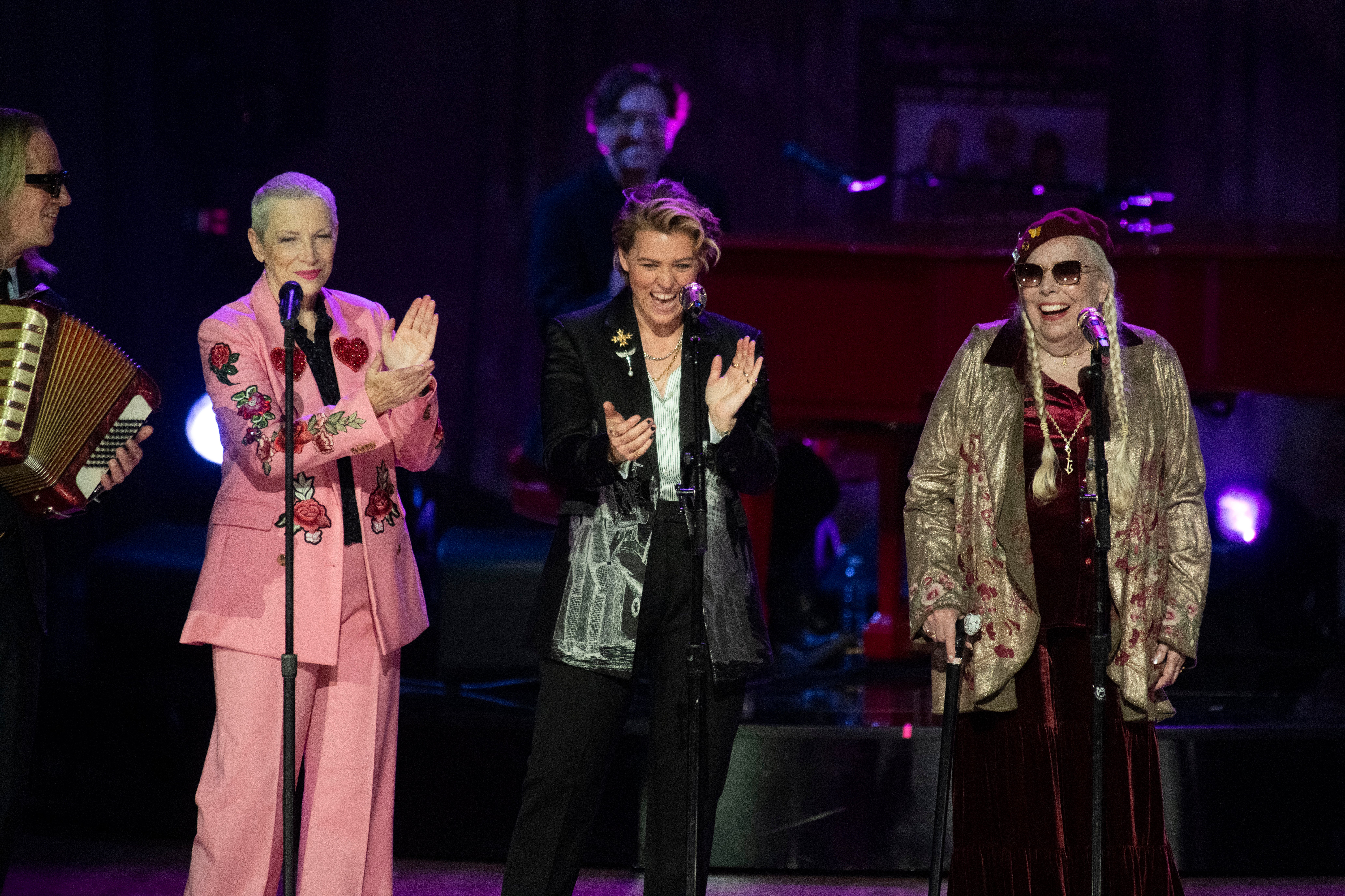 Annie Lennox, Brandi Carlile and Joni Mitchell performing together in 2024