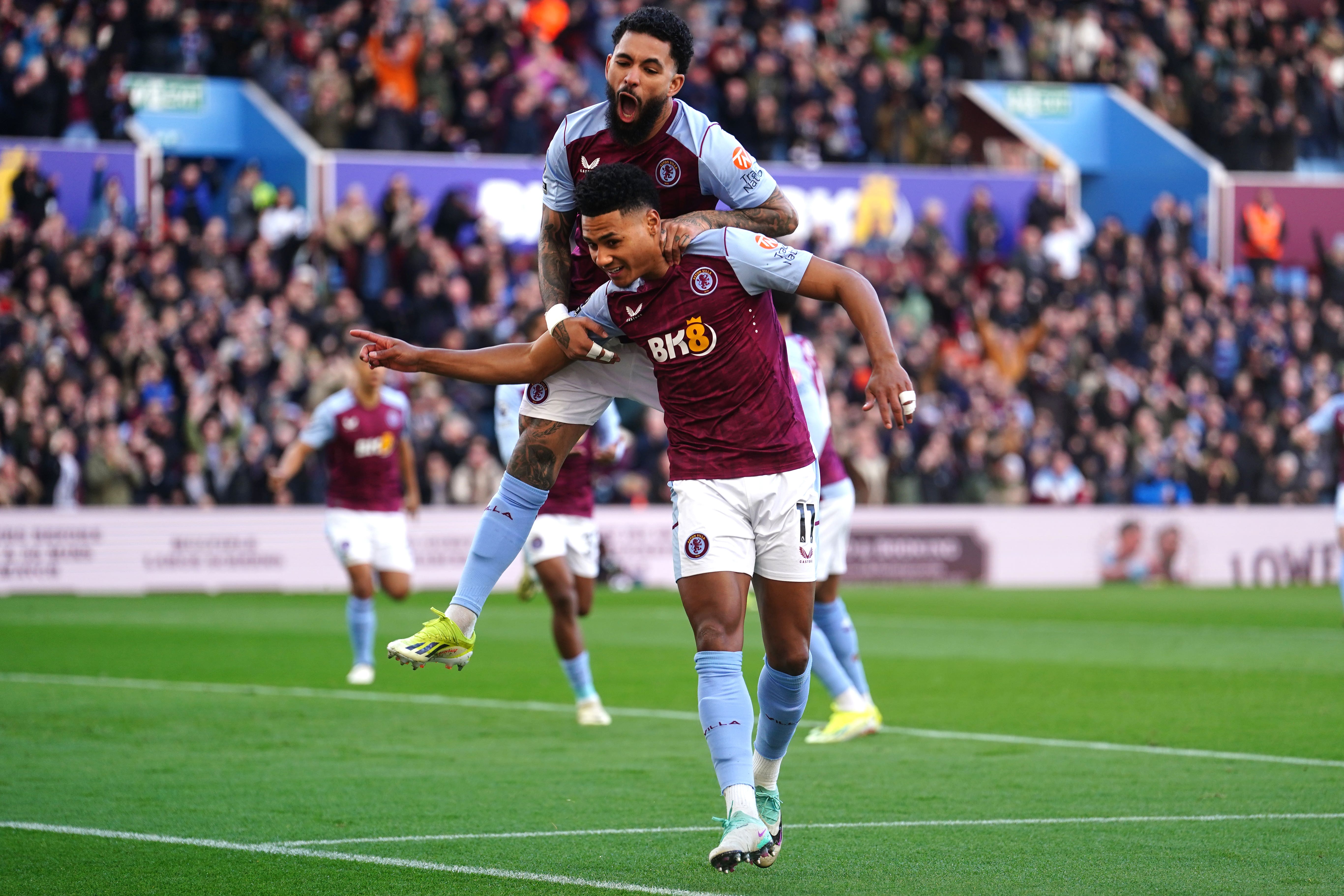 Ollie Watkins celebrates with Douglas Luiz for Aston Villa (David Davies/PA)