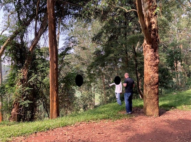 A former member of genocidal youth militia Interahamwe points out a location where Eric Nshimiye, the Ohio engineer arrested this month, allegedly killed a 14-year-old boy during the Rwandan genocide