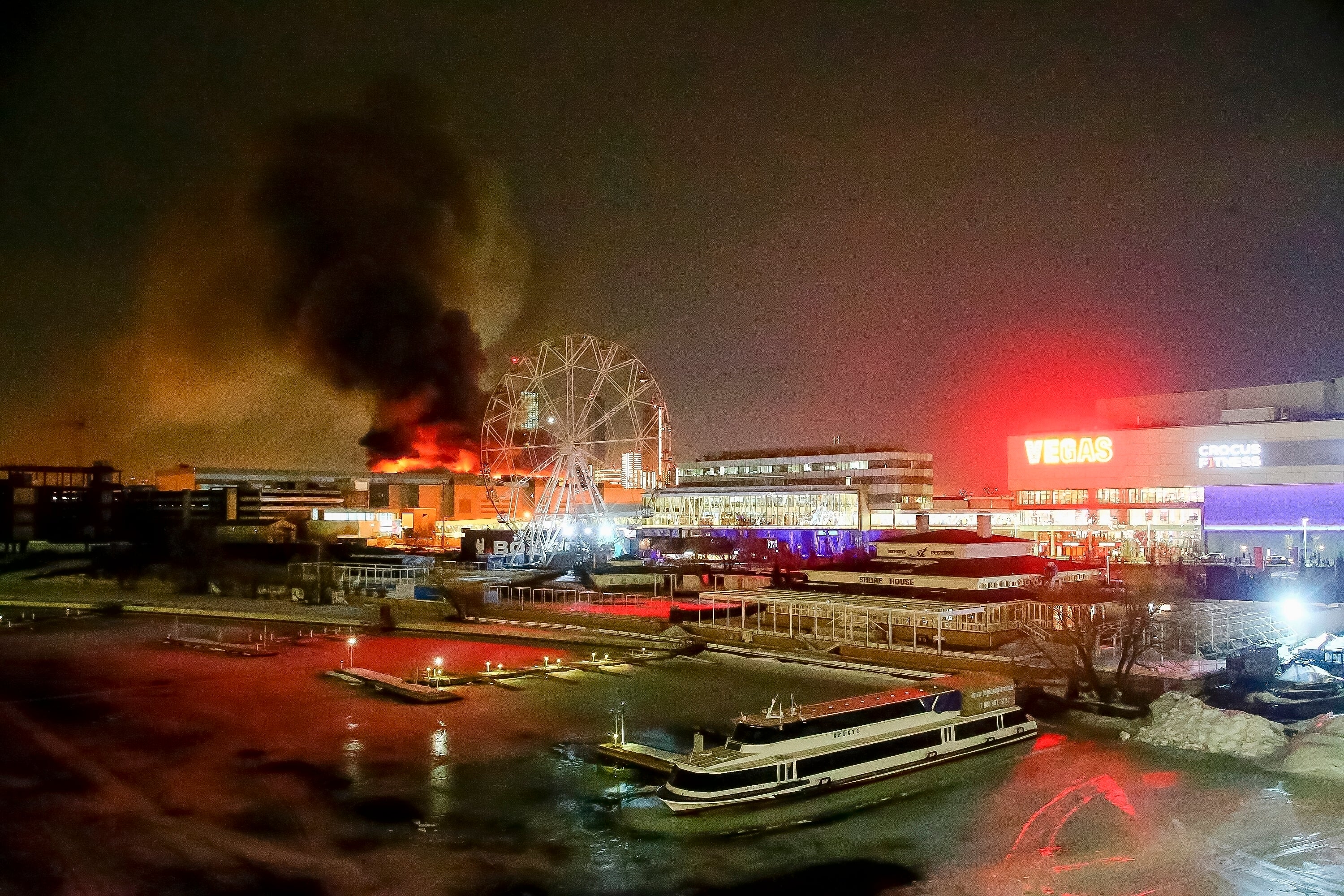 A massive blaze over the venue after an incendiary device was thrown