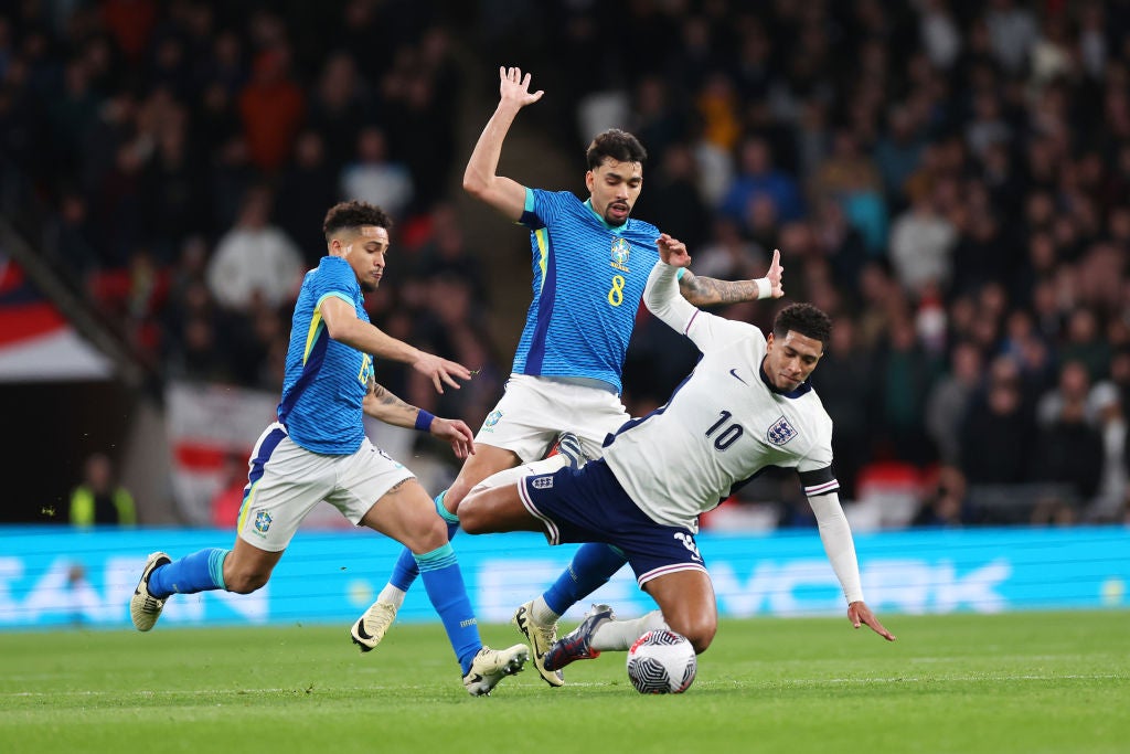 Bellingham is fouled by Lucas Paqueta, who was lucky to stay on