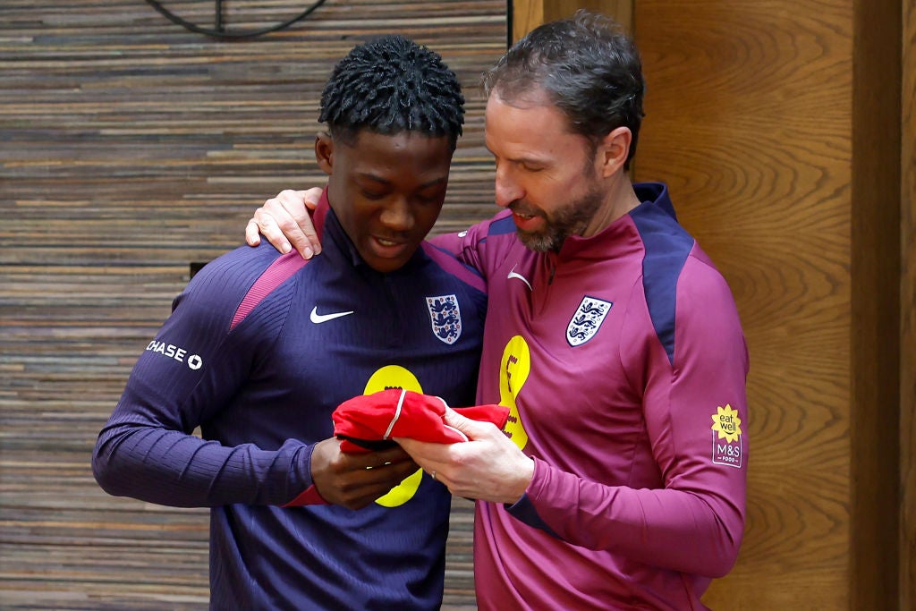 Mainoo is presented with his first England cap after appearing against Brazil