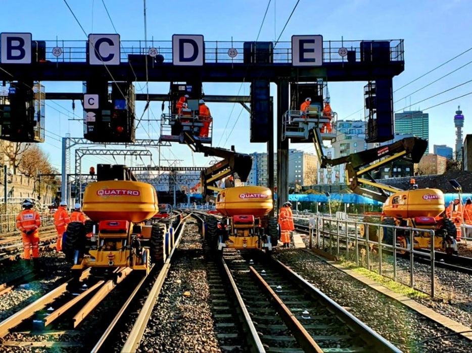 Delay reaction: Network Rail staff outside London Euston