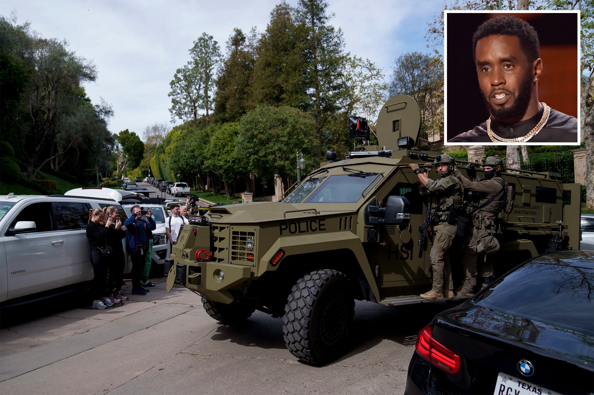 Law enforcement rides a vehicle near a property belonging to Sean “Diddy” Combs on Monday, March 25, 2024, in Los Angeles