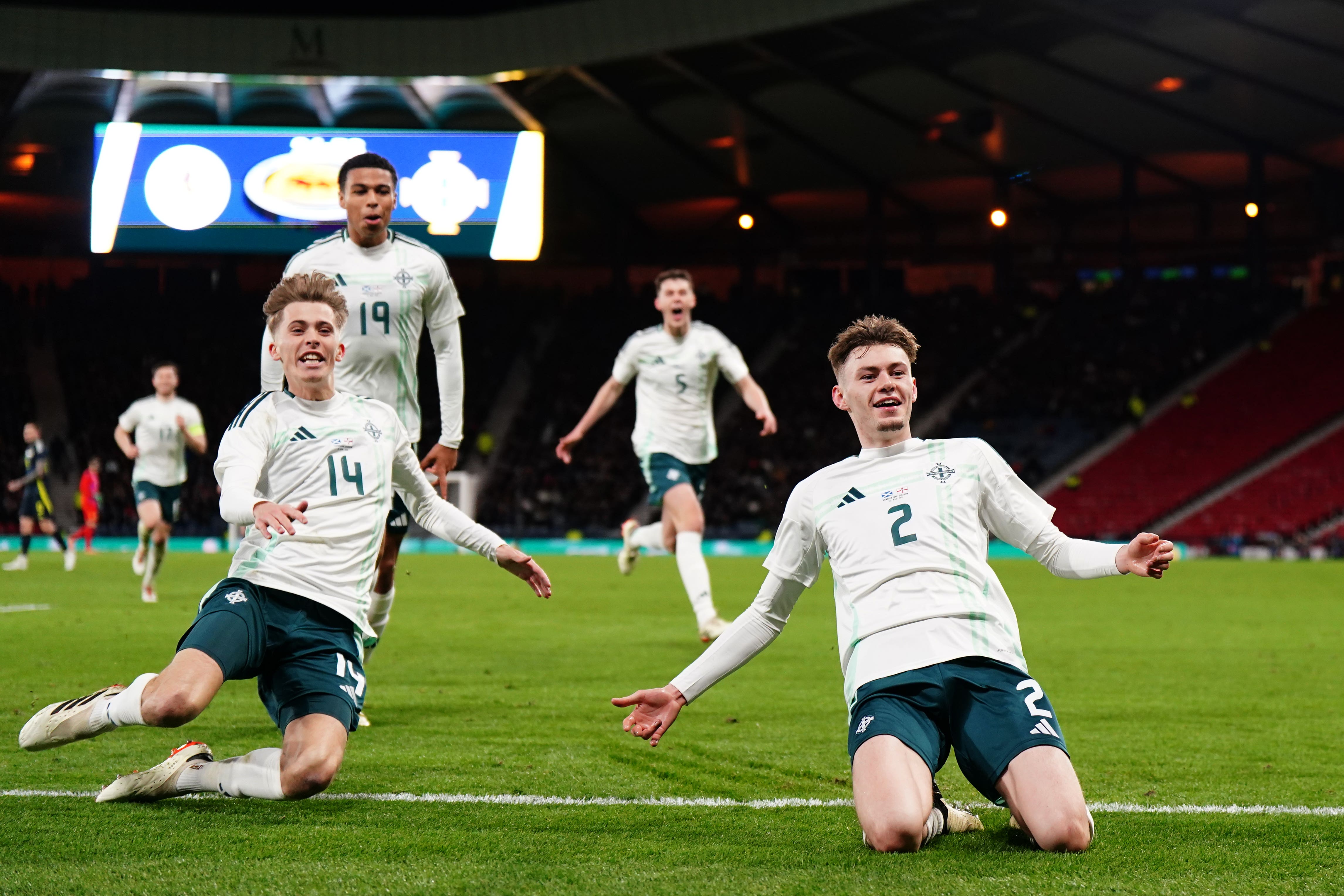 Northern Ireland’s Conor Bradley (right) scored against Scotland ( Jane Barlow/PA)