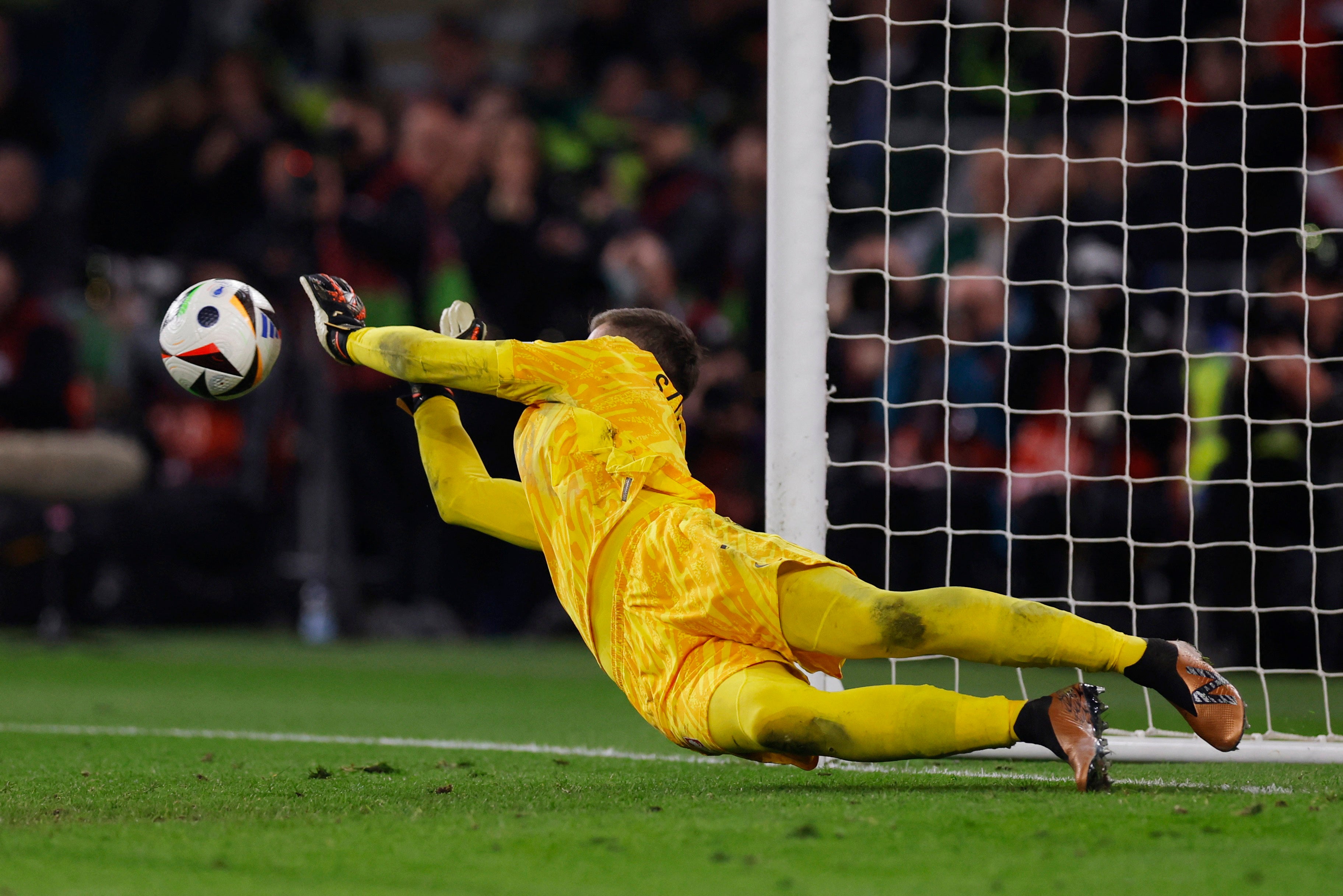 Wojciech Szczesny saves Daniel James’s penalty to end Wales’ hopes of reaching Euro 2024