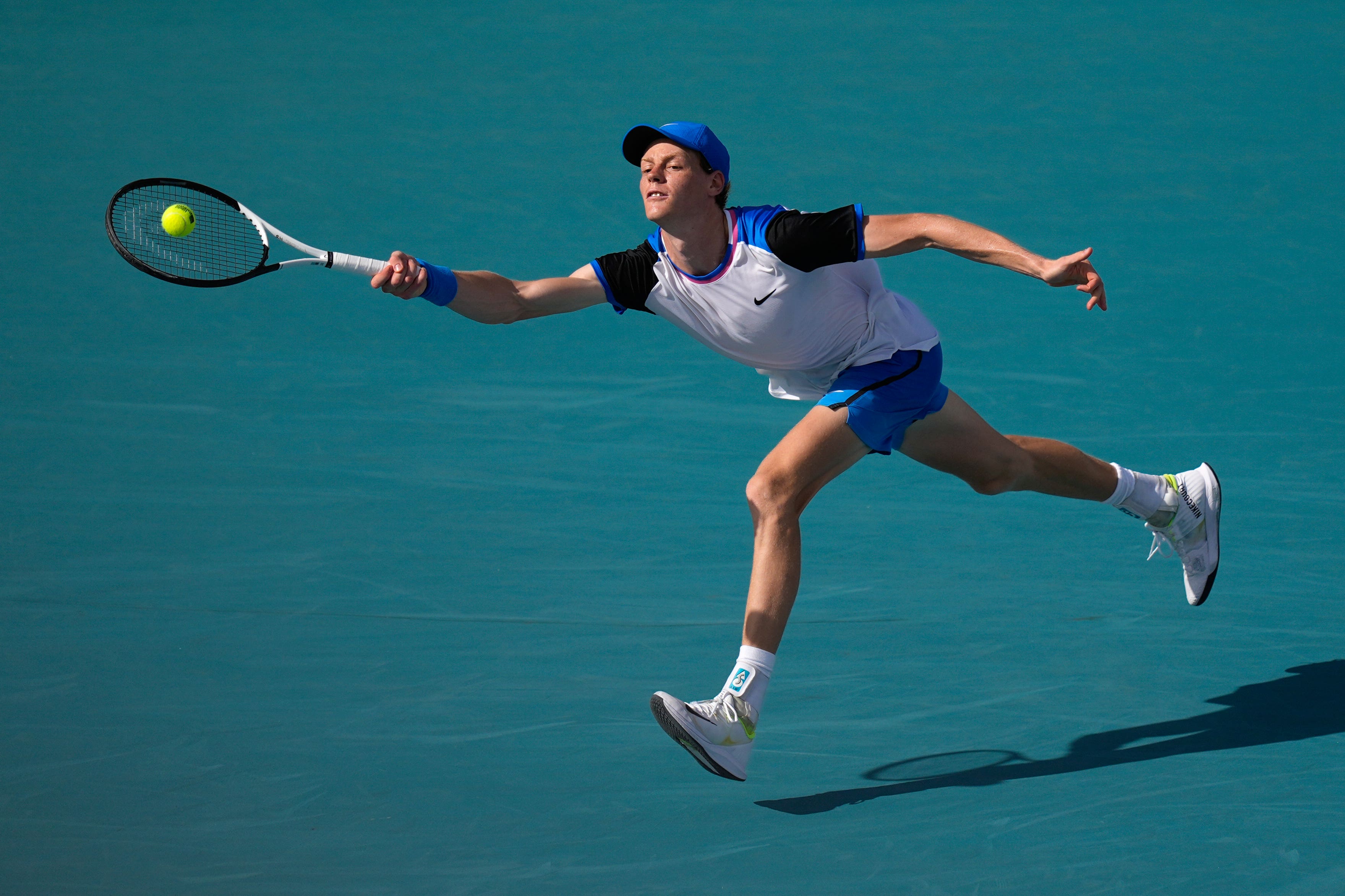 Jannik Sinner, of Italy, lunges for a ball from Christopher O’Connell (Rebecca Blackwell/AP)