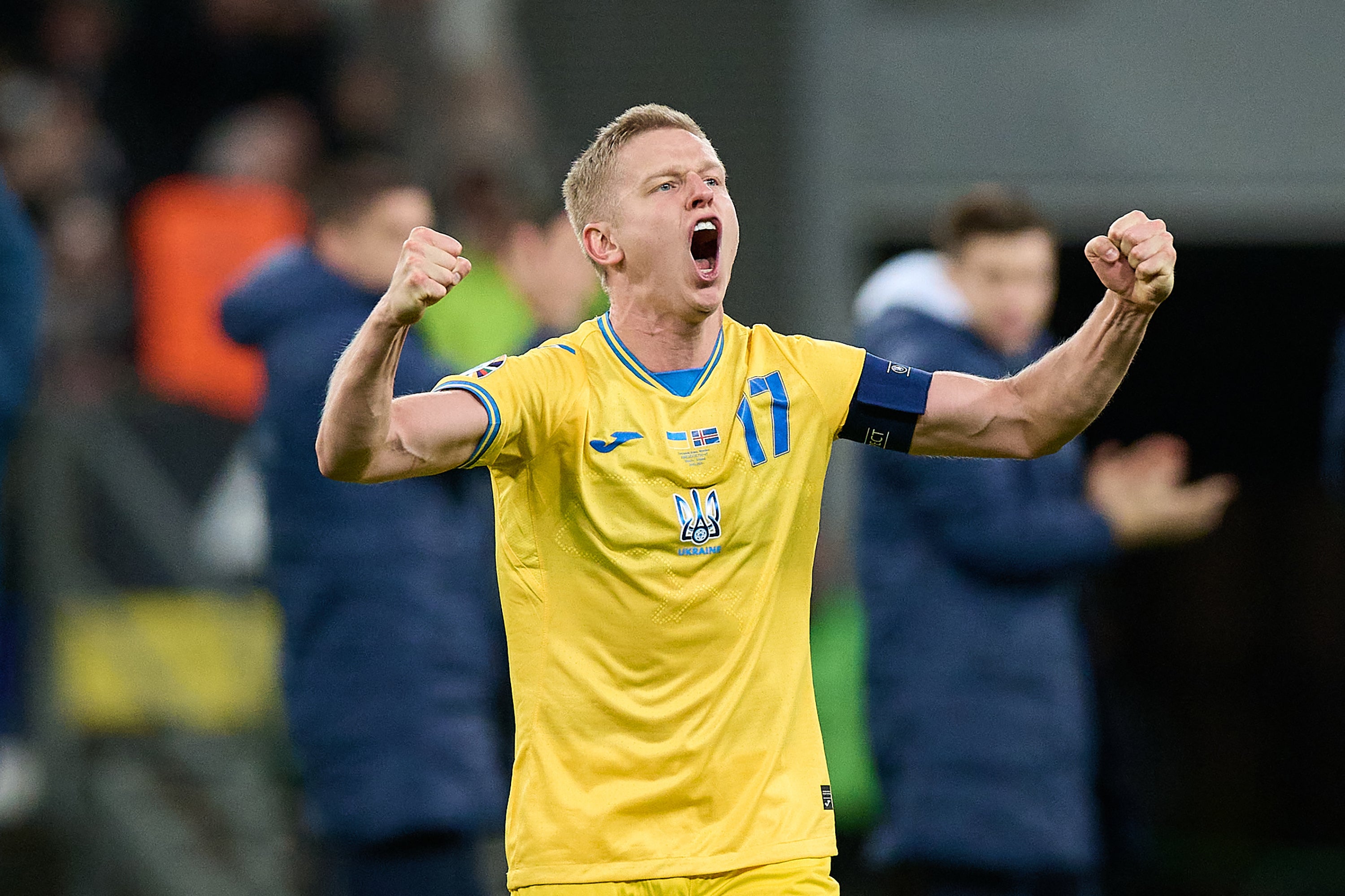 Ukraine captain Oleksandr Zinchenko celebrates his country’s win