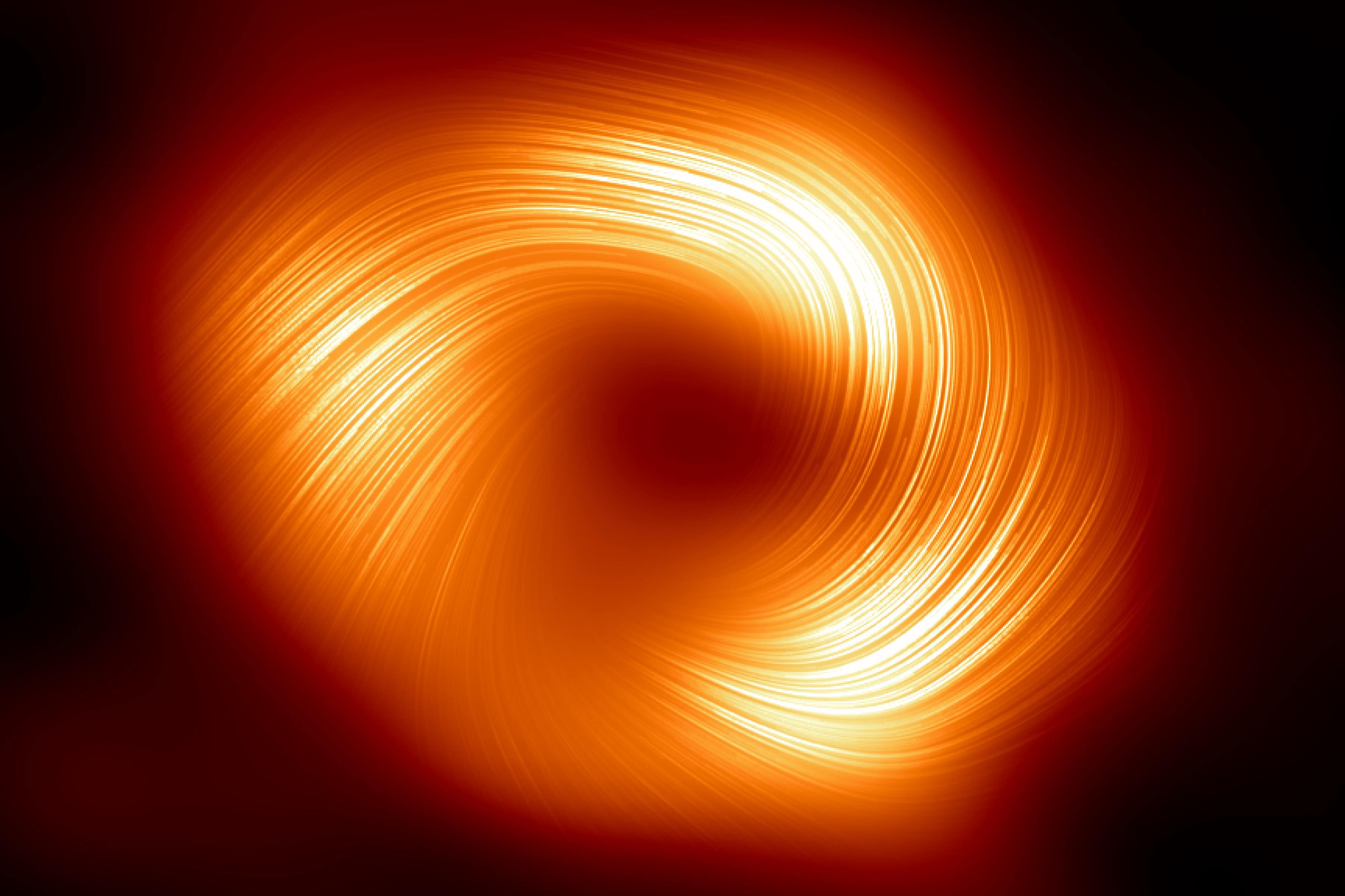 The supermassive black hole Sagittarius A* was viewed in polarised light for the first time (EHT Collaboration/ESO/PA)