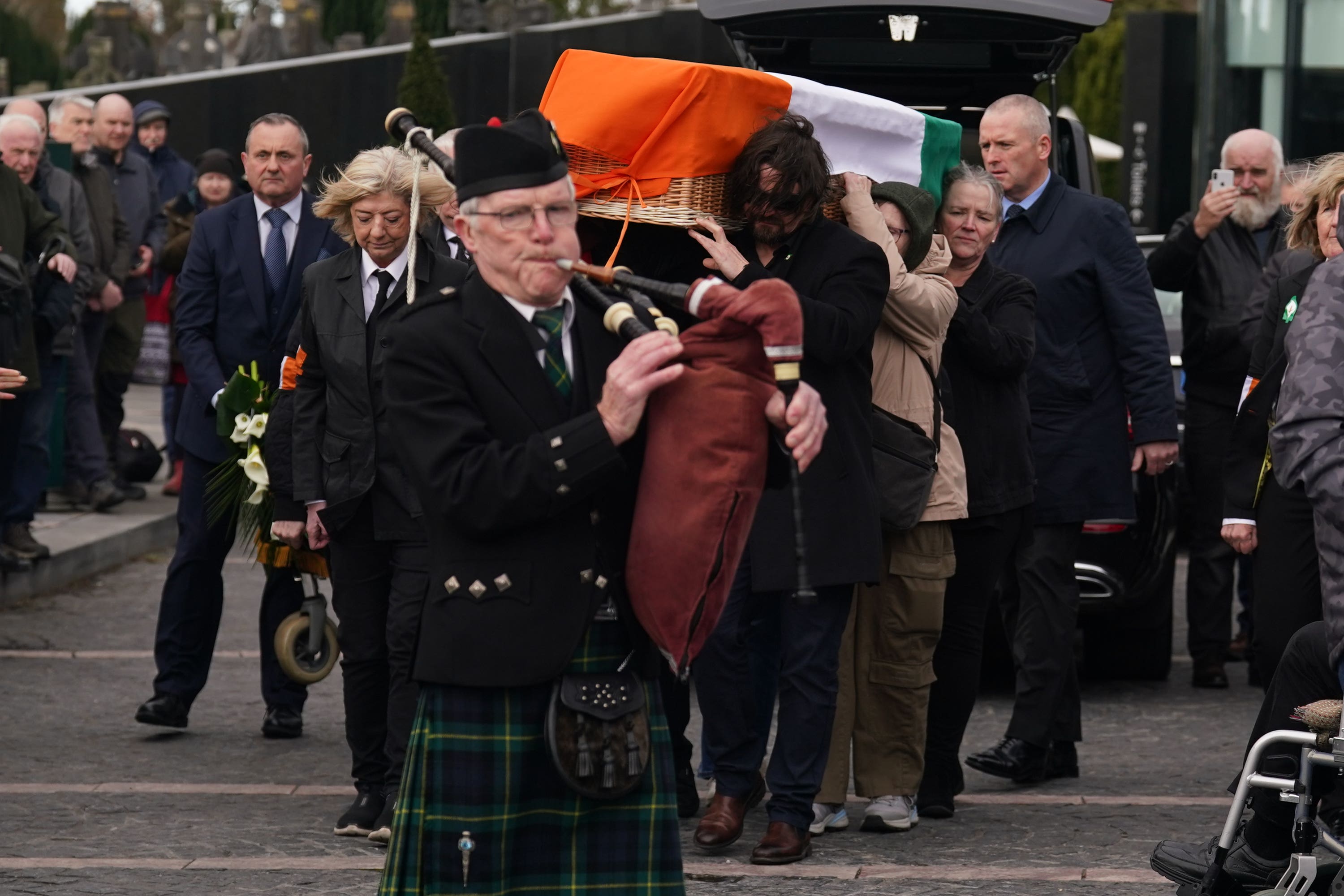 The coffin of veteran republican Rose Dugdale is carried to the Crematorium Chapel in Glasnevin, Dublin (PA)