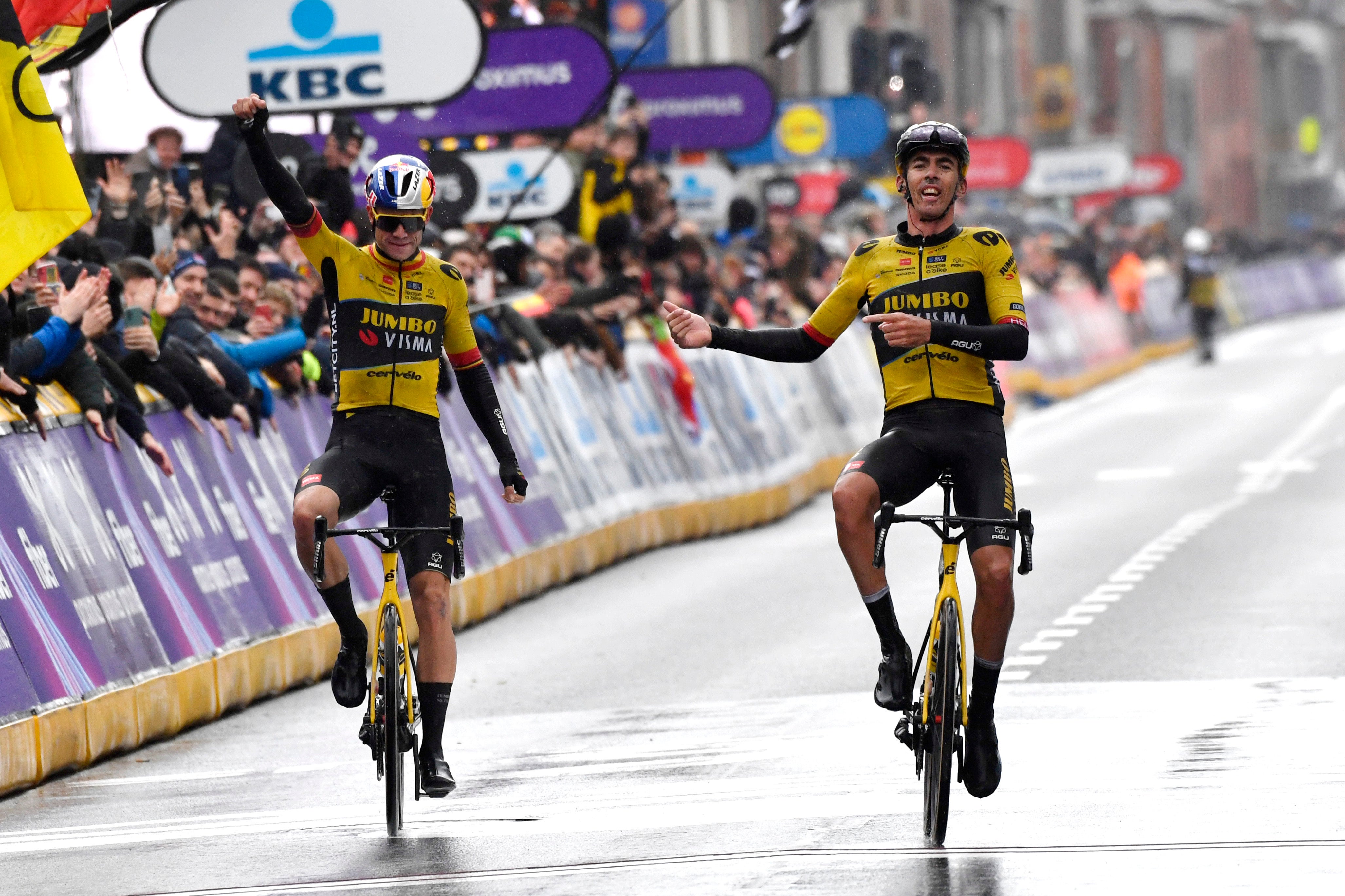 Wout van Aert, left, with teammate Christophe Laporte