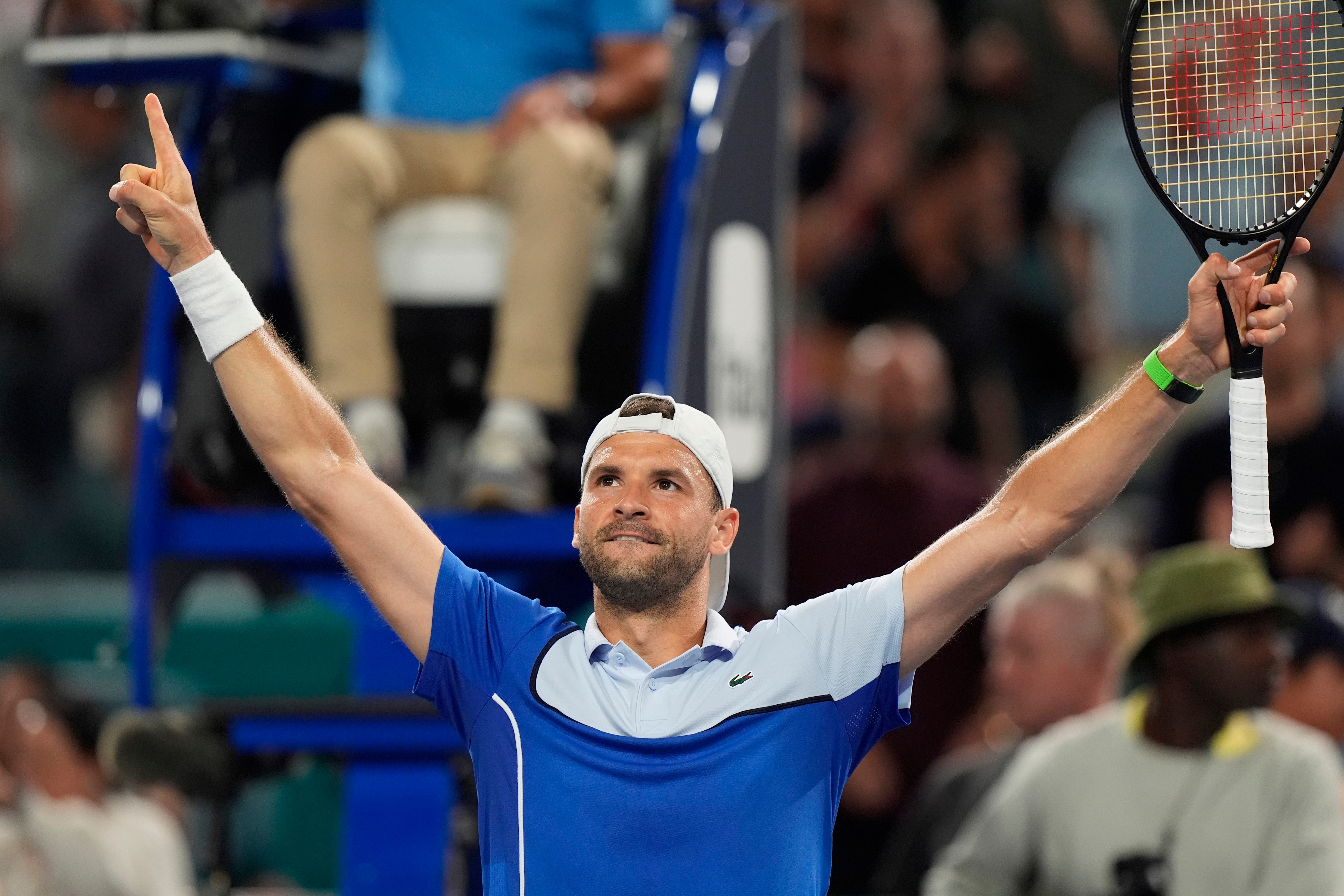 Grigor Dimitrov of Bulgaria celebrates after defeating Carlos Alcaraz (Marta Lavandier/AP)