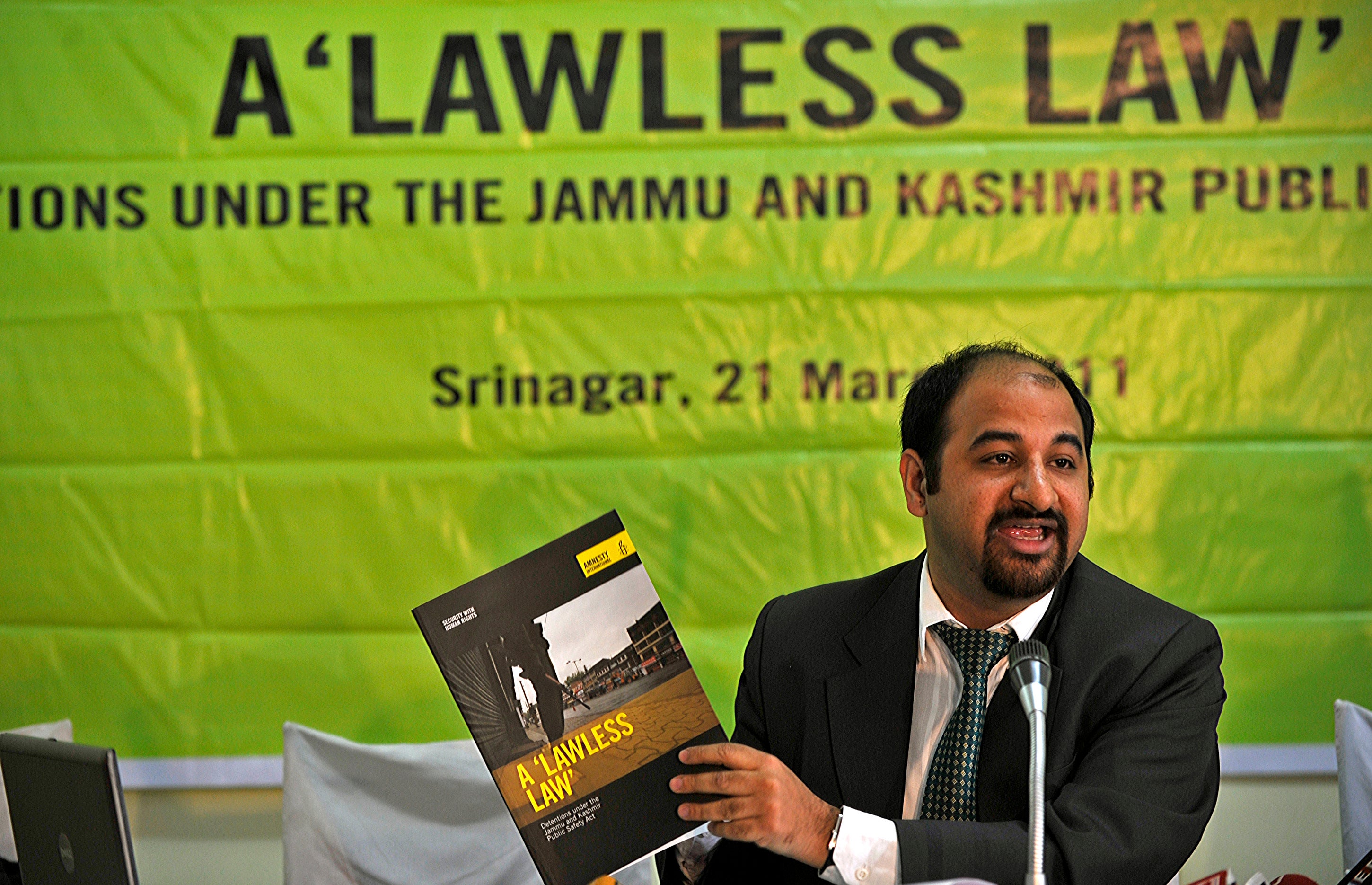 Amnesty has long called out rights abuses in India – in this 2011 picture, an official, Vikramjeet Batra, is seen launching a report on Kashmir