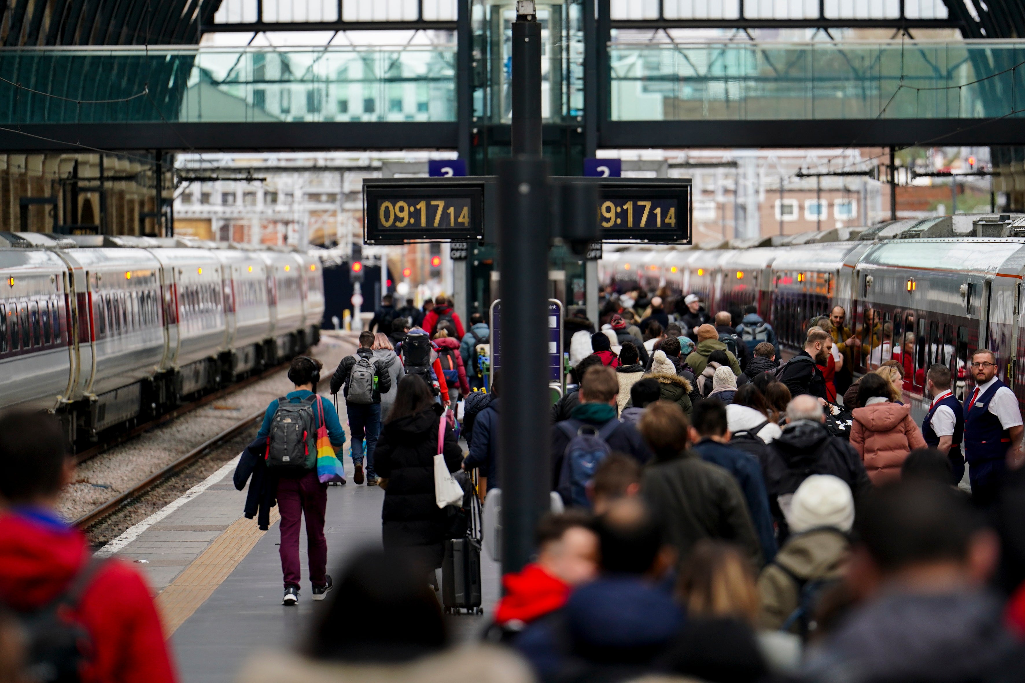 Passengers on the platform at London King's Cross Station as the getaway continues for the Easter weekend