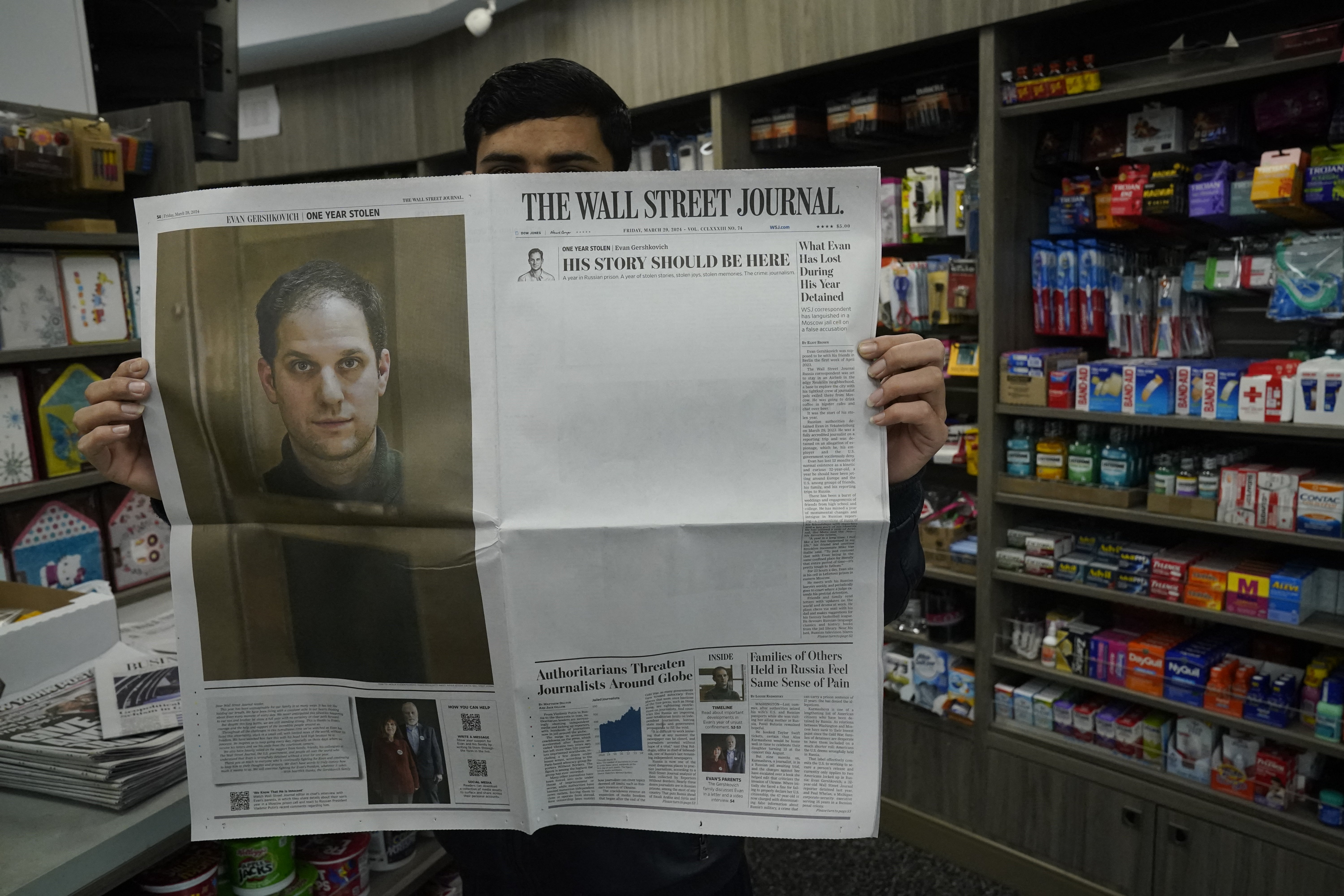 Friday’s Wall Street Journal shows a mostly blank front page to mark the first anniversary of the imprisonment in Russia of its reporter