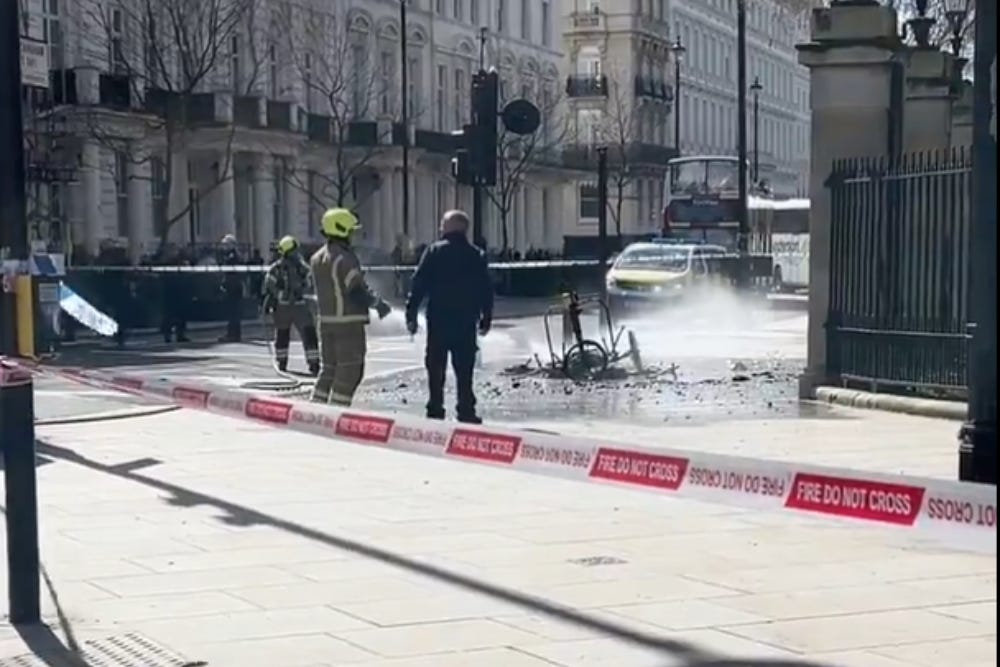 An electric rickshaw caught fire outside Buckingham Gate (Greg Double/PA)