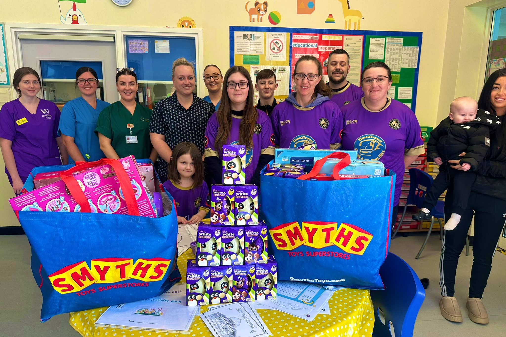 The women’s futsal team at FC United of Wrexham visited Wrexham children’s ward to spread ‘Easter joy’ by donating chocolate Easter eggs (Andrew Ruscoe/PA)