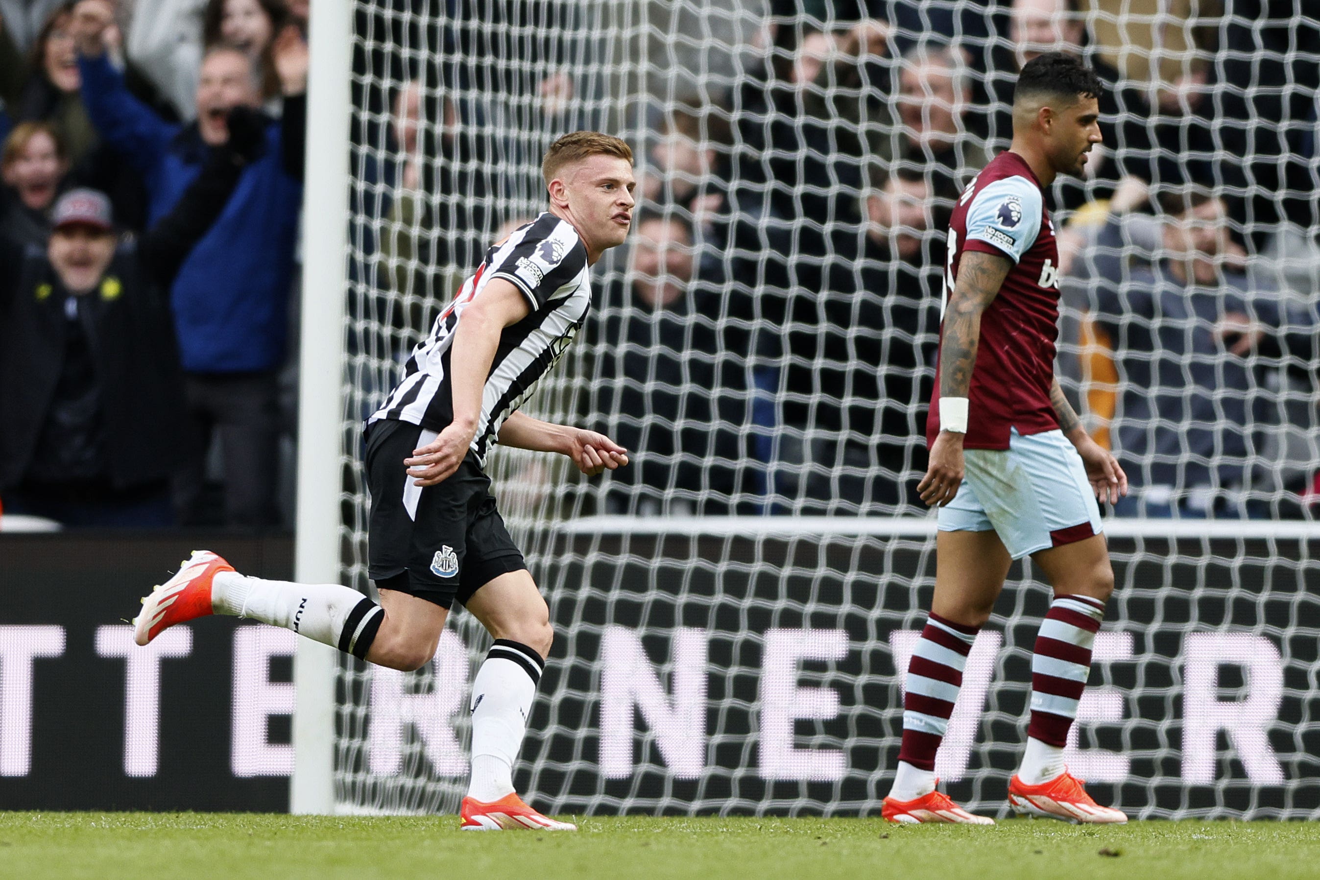 Newcastle’s Harvey Barnes celebrates the decisive goal in a 4-3 comeback victory over West Ham (Richard Sellers/PA)