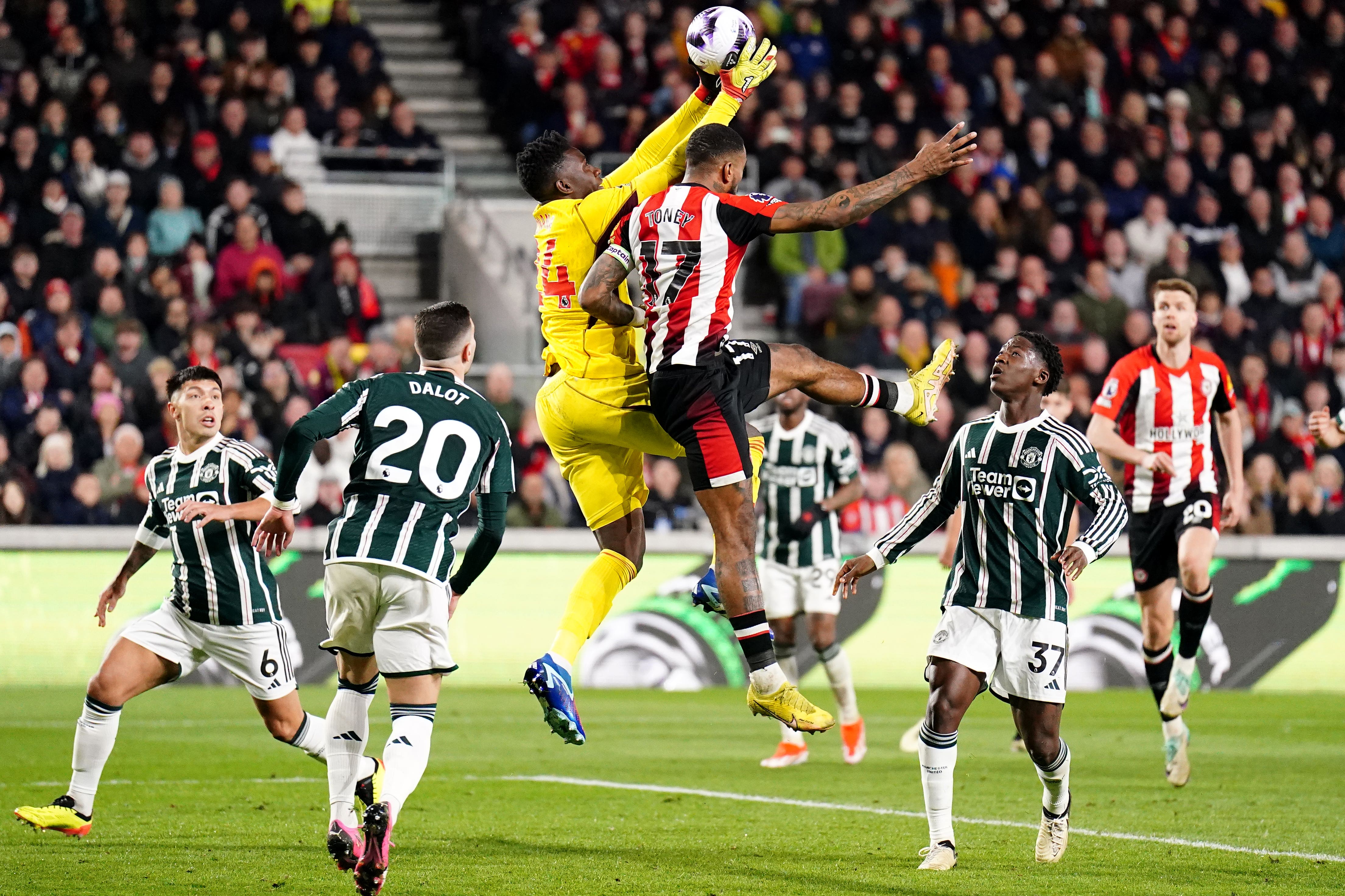 Andre Onana is not giving up hope of claiming a top-four spot (Zac Goodwin/PA)