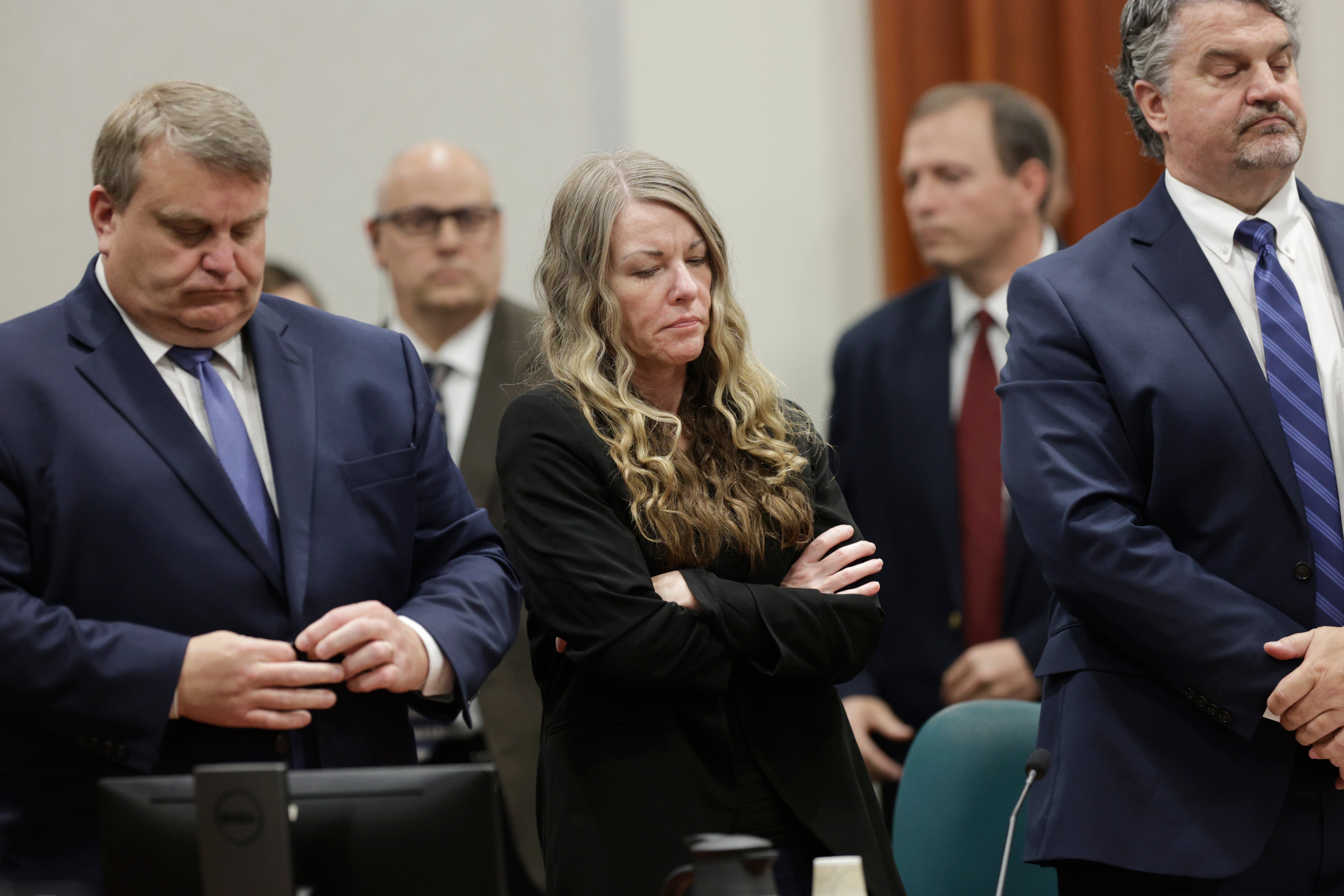 Lori Vallow Daybell stands and listens as the jury’s verdict is read at the Ada County Courthouse in Boise