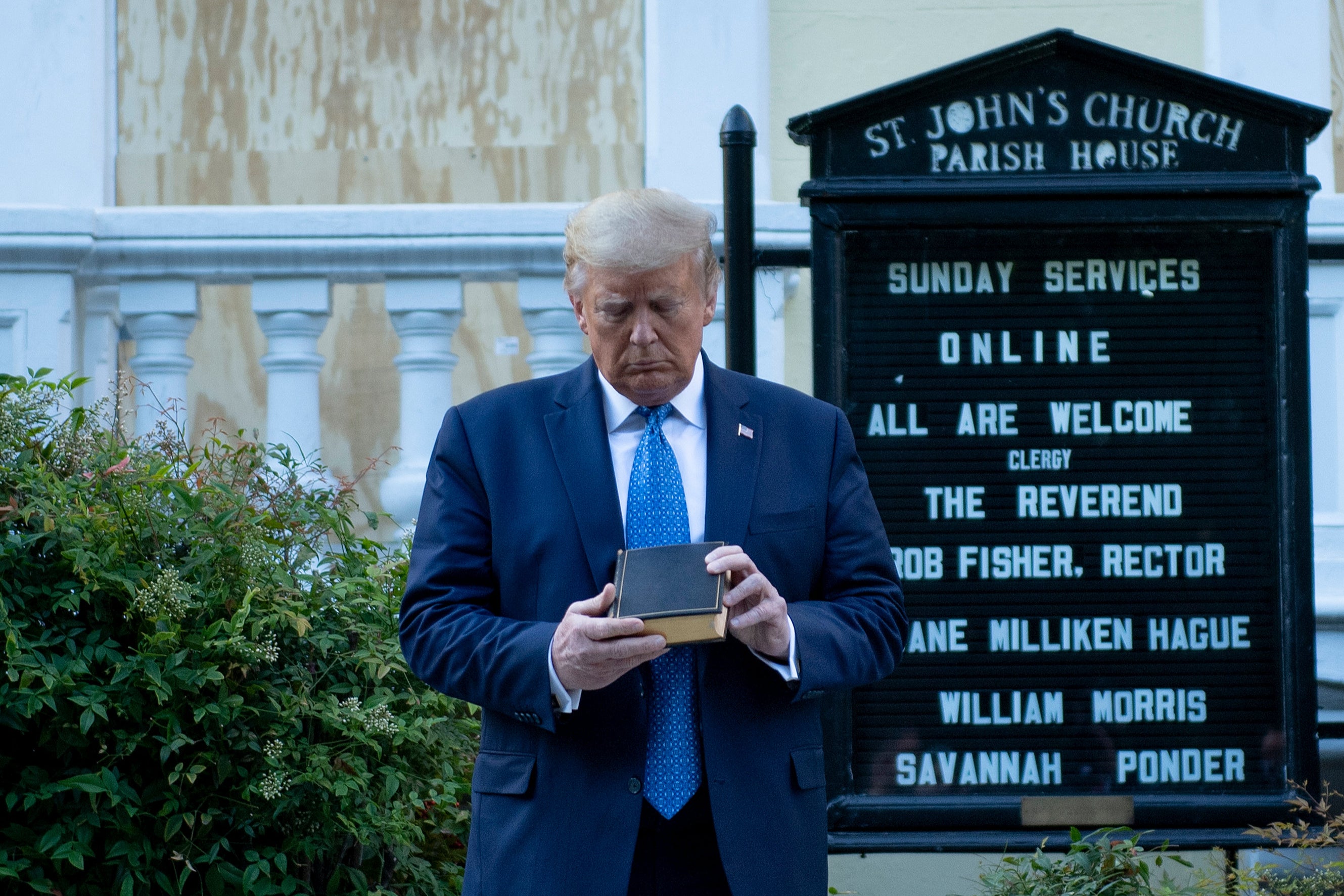 Donald Trump holds a Bible while visiting St. John's Church across from the White House after the area was cleared of people protesting the death of George Floyd June 1, 2020, in Washington, DC