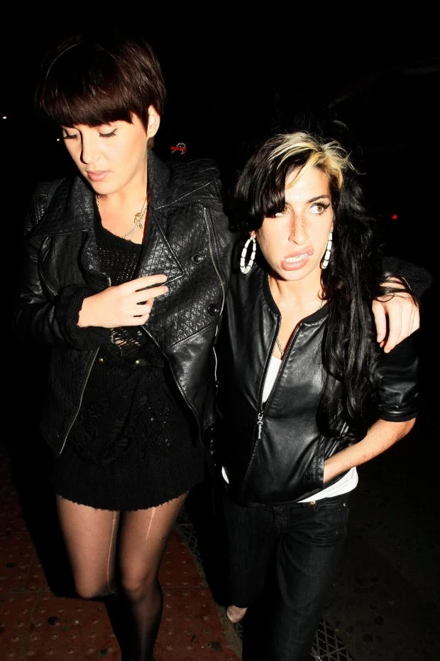 Parry and Winehouse leaving the Diner Bar in Camden after a night out