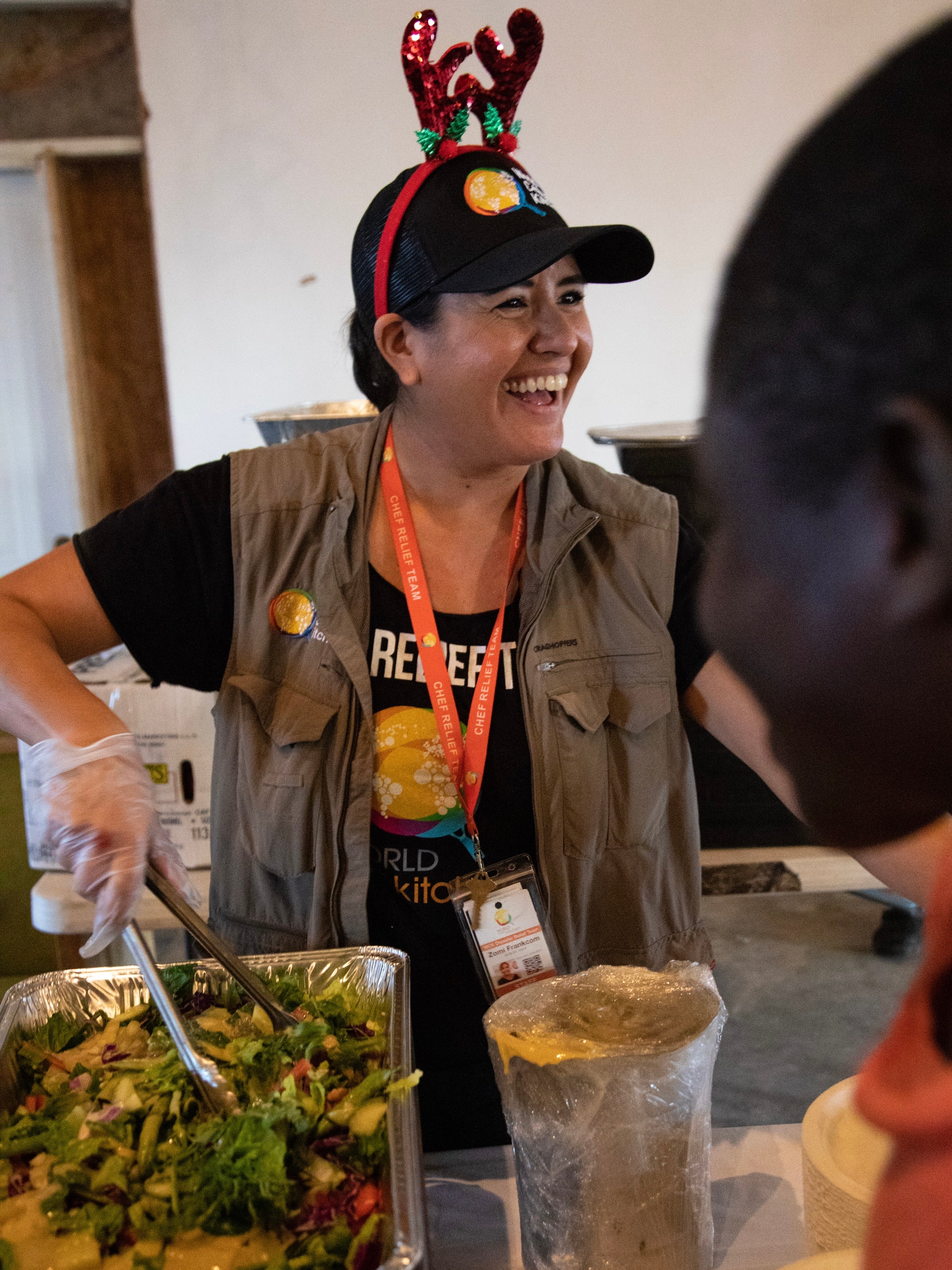 Zomi distributing food for World Central Kitchen