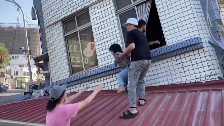 Moment toddler rescued from collapsing restaurant after deadly Taiwan earthquake