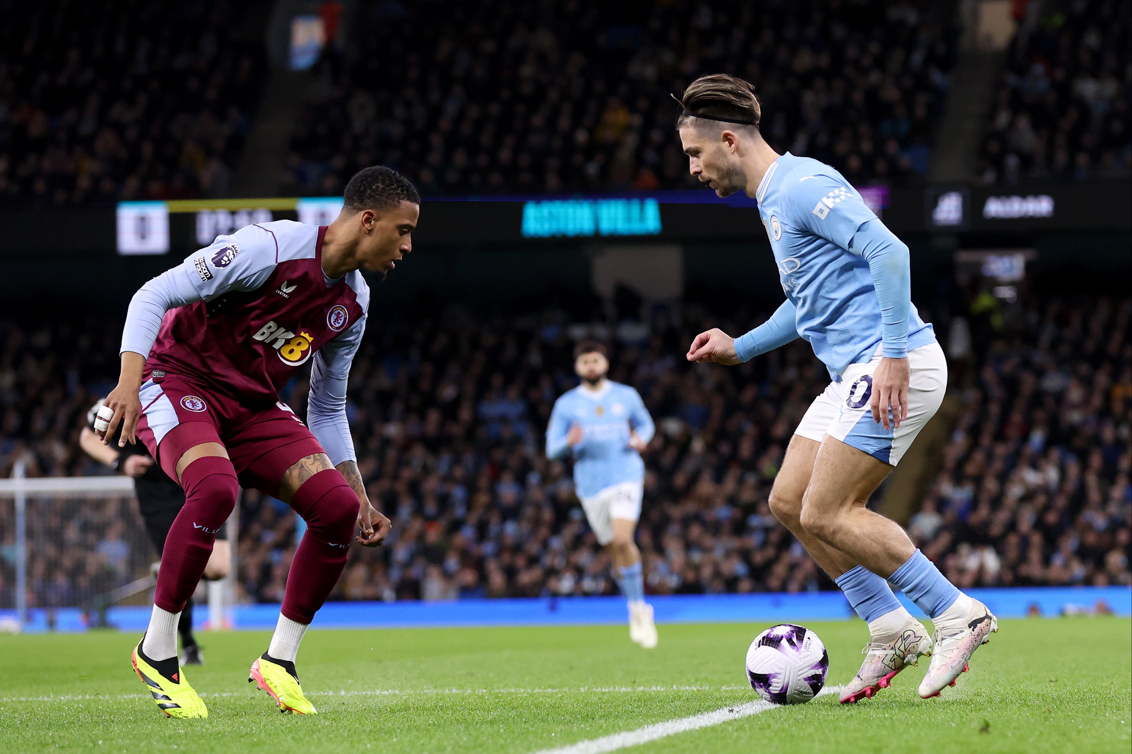 Jack Grealish playing for Manchester City against his boyhood club, Aston Villa